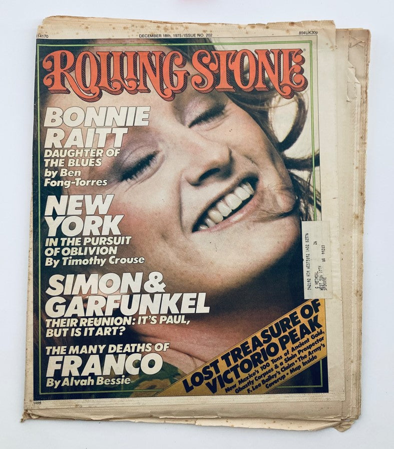 Vintage Rolling Stone Magazine December 18 1975 No. 202 featuring Bonnie Raitt on the cover, showcasing her smiling expression and headlines about musical topics from that era.