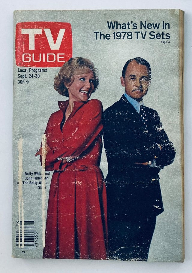 Cover of TV Guide Magazine from September 24, 1977 featuring Betty White and John Hillerman. The headline reads 'What's New in The 1978 TV Sets'. The magazine showcases a vintage design and local programming details.