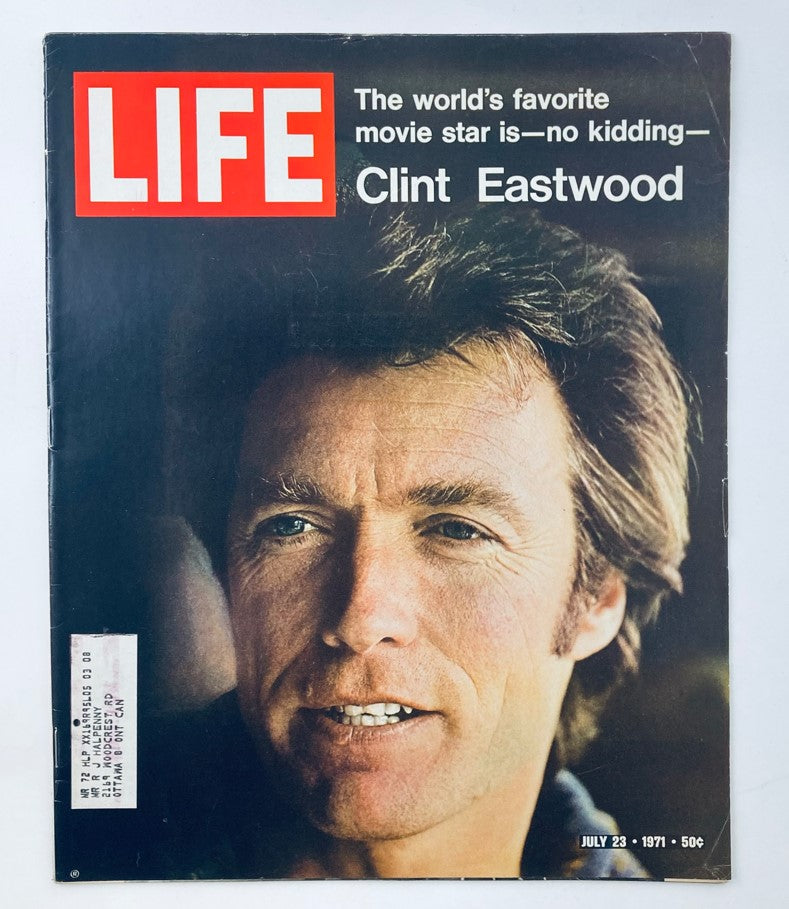 Cover of VTG Life Magazine July 23, 1971, featuring Clint Eastwood, highlighting him as the world's favorite movie star with captivating imagery and bold text.
