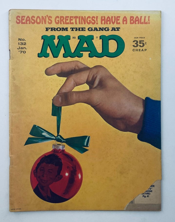 Cover of Mad Magazine January 1970 No. 132 titled 'Season's Greetings', depicting a hand holding a Christmas ornament featuring a character in a red ball, signifying classic satire and humor.