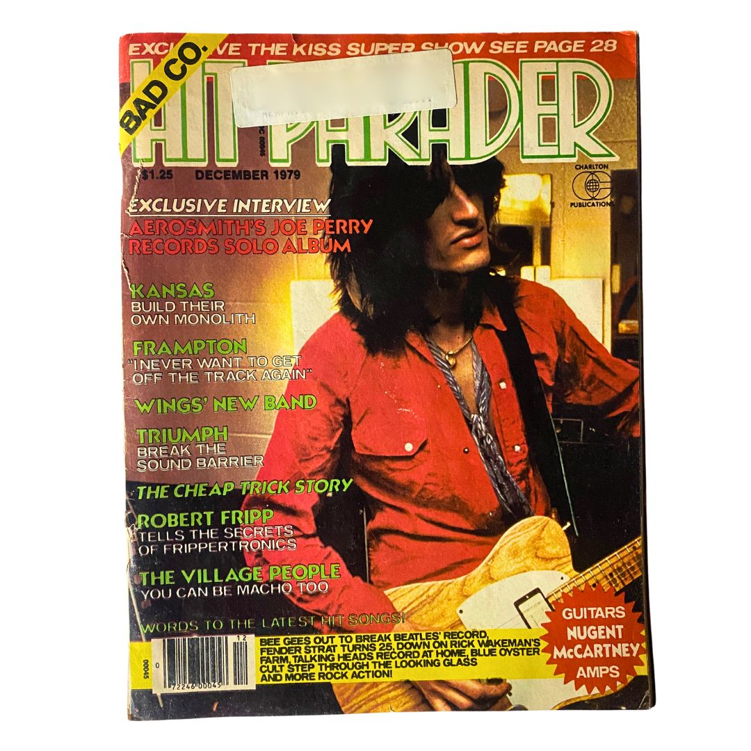 Cover of VTG Hit Parader Magazine December 1979 featuring Joe Perry and Kansas, with details of exclusive articles, rock band highlights, and a prominent advertisement for the Kiss Super Show.