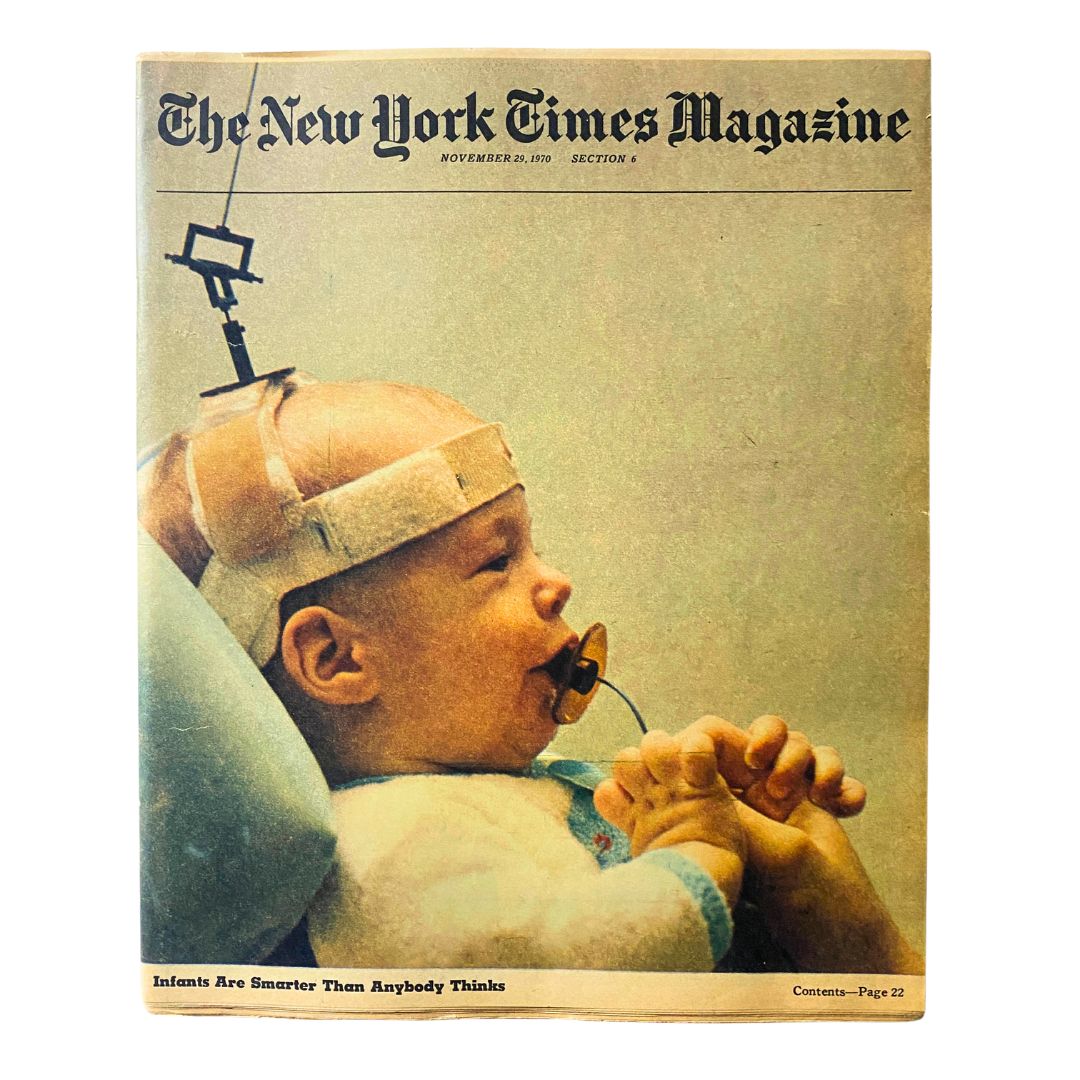 Cover of The New York Times Magazine from November 29, 1970, featuring the article 'Infants Are Smarter Than Anybody Thinks,' showcasing a baby in a scientific experiment setup.