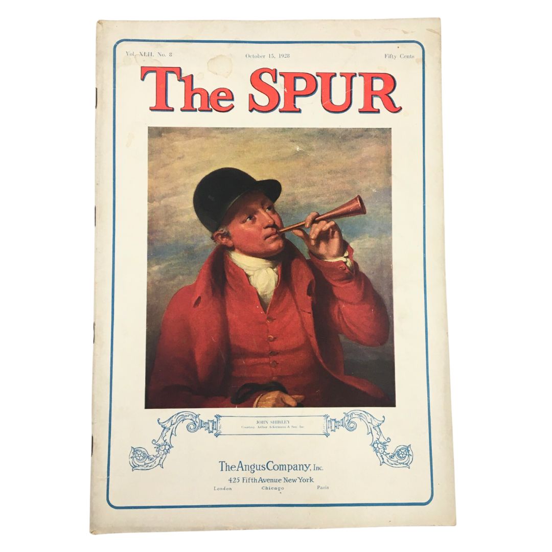 Vintage VTG The Spur Magazine from October 15, 1928, featuring the cover illustration 'The Hunt Ball' by William Schwarz, showcasing a man playing a horn in traditional attire.