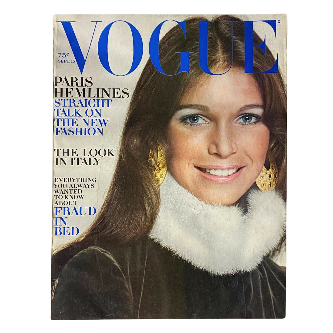Cover of VTG Vogue Magazine September 15 1970 featuring a model with long hair and earrings, photographed by David Bailey.