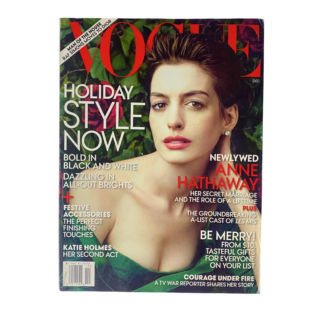 Vogue Magazine December 2012 cover featuring actress Anne Hathaway, showcasing her elegant beauty and fashion style.