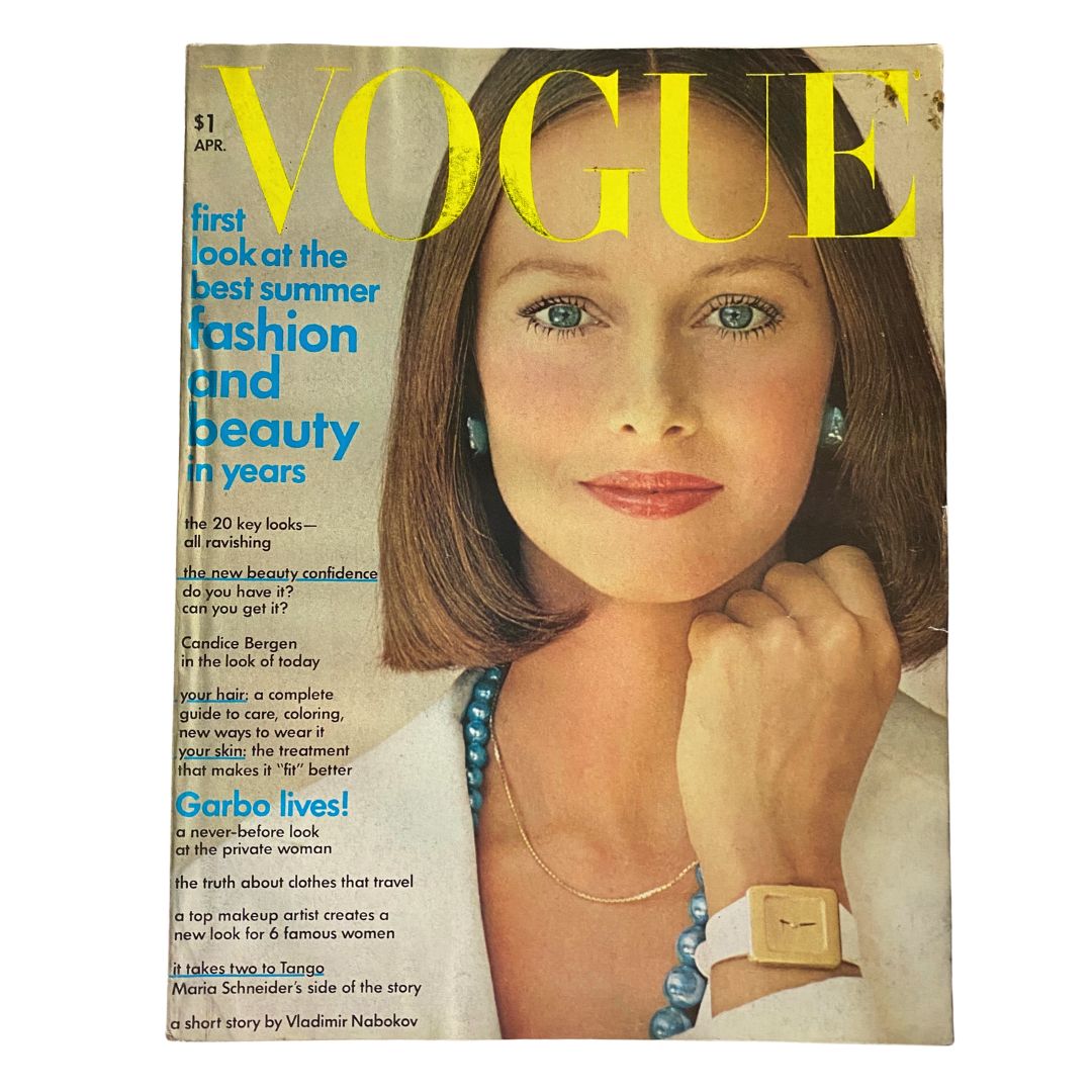 VTG Vogue Magazine April 1973 featuring Karen Graham on the cover with a blue necklace and youthful makeup, capturing the essence of 70s fashion.