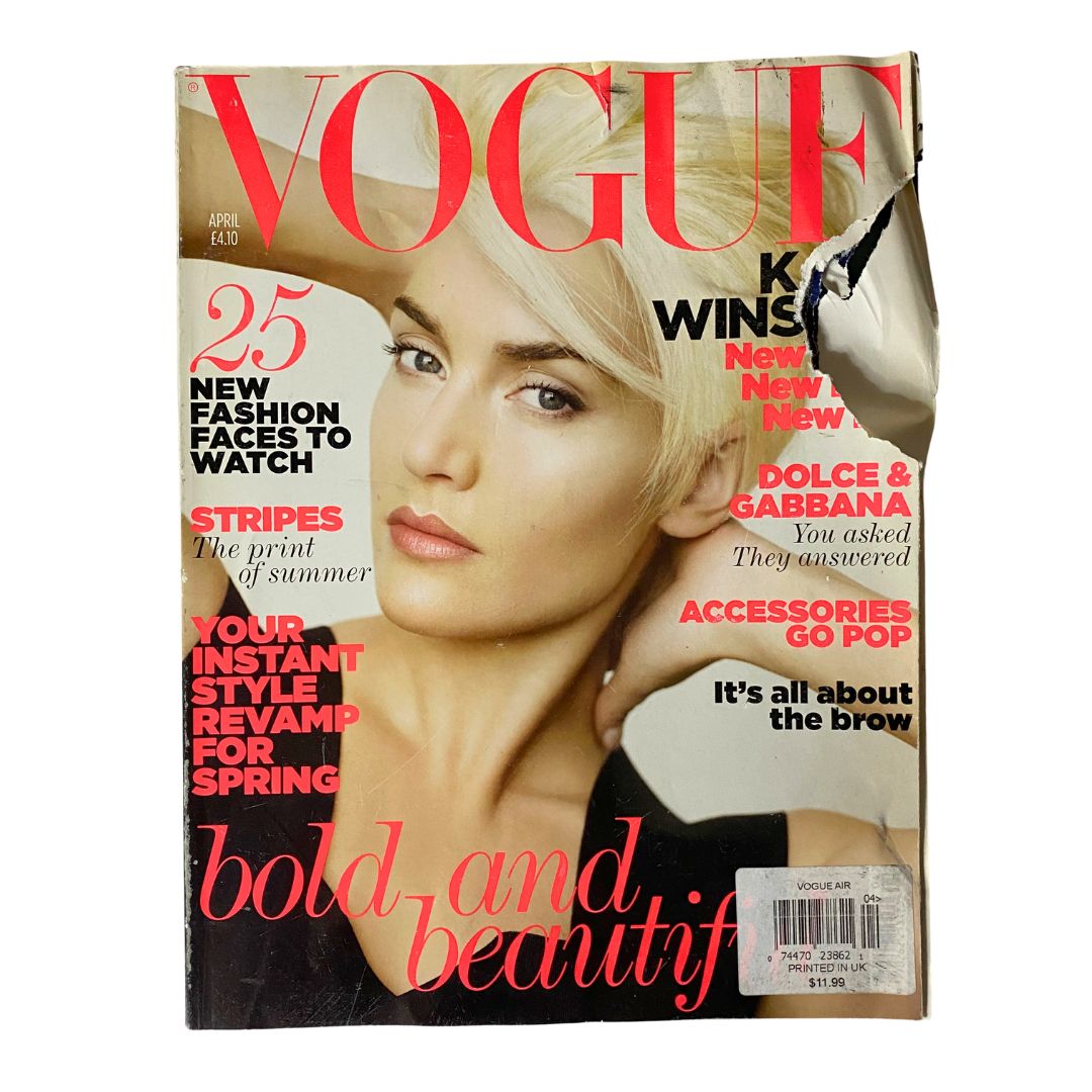 Vogue Magazine April 2011 cover featuring Kate Winslet, photographed by Mario Testino, showcasing her bold and beautiful style with fashion insights and trends.