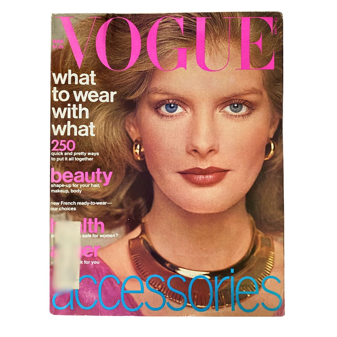 VTG Vogue Magazine March 1976 featuring Rene Russo on the cover, photographed by Francesco Scavullo, showcasing 70s glamour with a focus on beauty and accessories.
