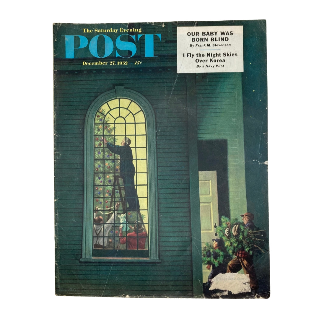Cover of the Saturday Evening Post Magazine December 27, 1952, featuring a festive window scene by artist Steven Dohanos, highlighting Christmas Eve themes.