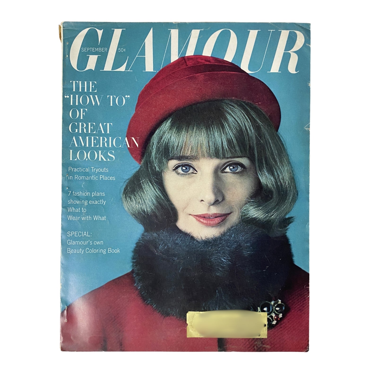 Cover of Glamour Magazine September 1962 featuring the title 'The "How To" of Great American Looks', showing a fashionable woman with a red hat and fur collar.