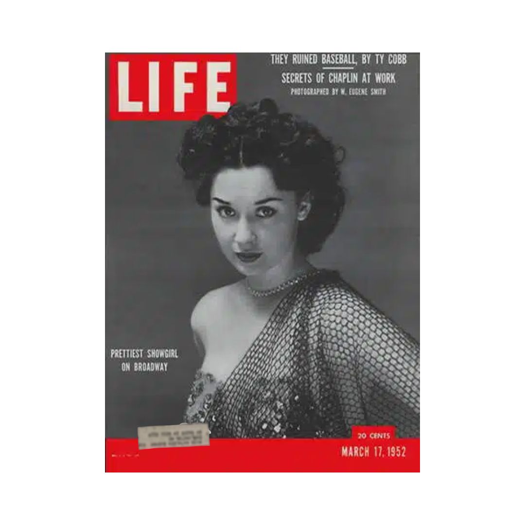 Cover of VTG Life Magazine from March 17, 1952, featuring the article 'Prettiest Show Girl On Broadway' and written by Ty Cobb. The magazine showcases a glamorous image of a showgirl, emphasizing vintage style and mid-20th-century culture.