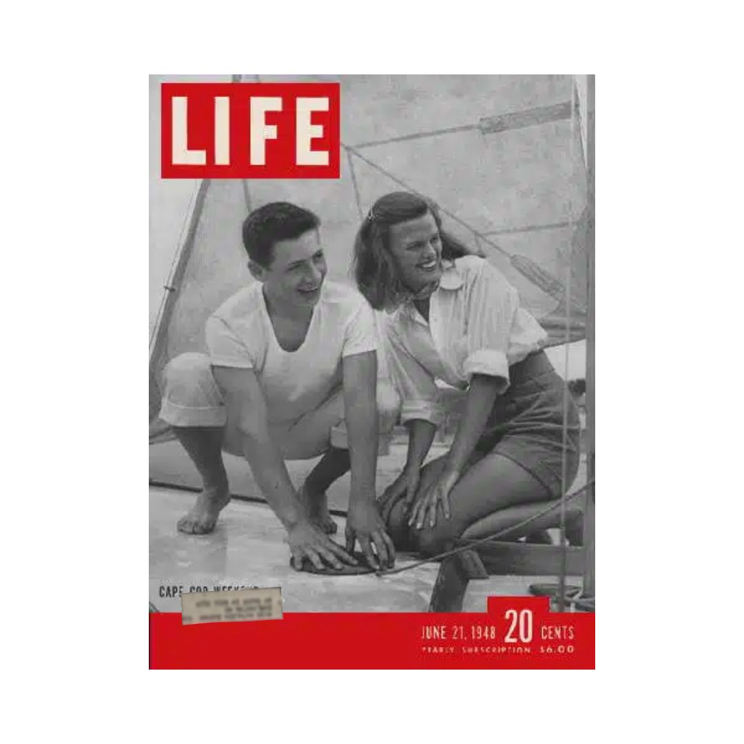 Cover of VTG Life Magazine June 21, 1948 featuring a charming Cape Cod weekend, showcasing a man and woman enjoying a leisurely moment on a sailboat.