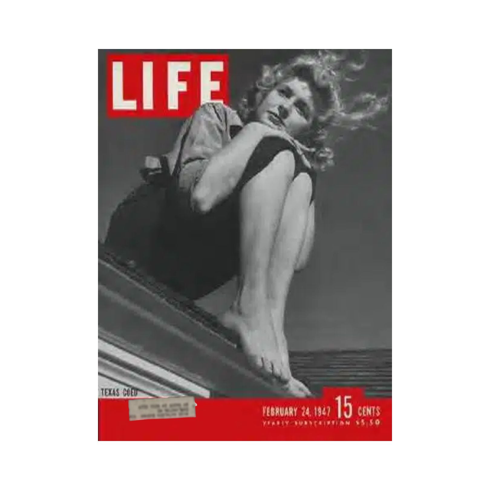Cover of VTG Life Magazine from February 24, 1947 featuring a Texas coed, showcasing a woman sitting on a roof with flowing hair, highlighting the style and culture of post-war America.