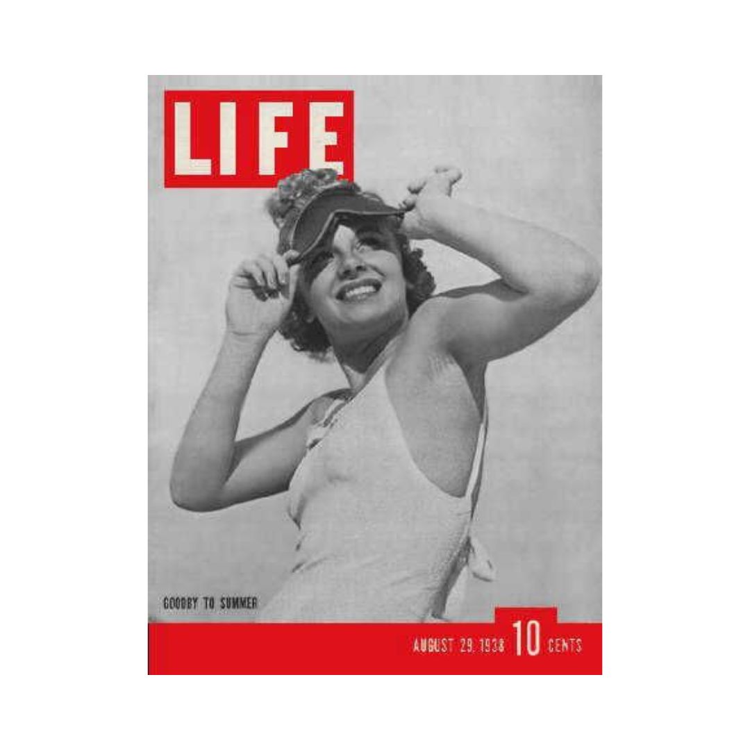 Cover of VTG Life Magazine August 29, 1938 featuring a woman in a swimsuit with sunshades, celebrating summer and vintage fashion.