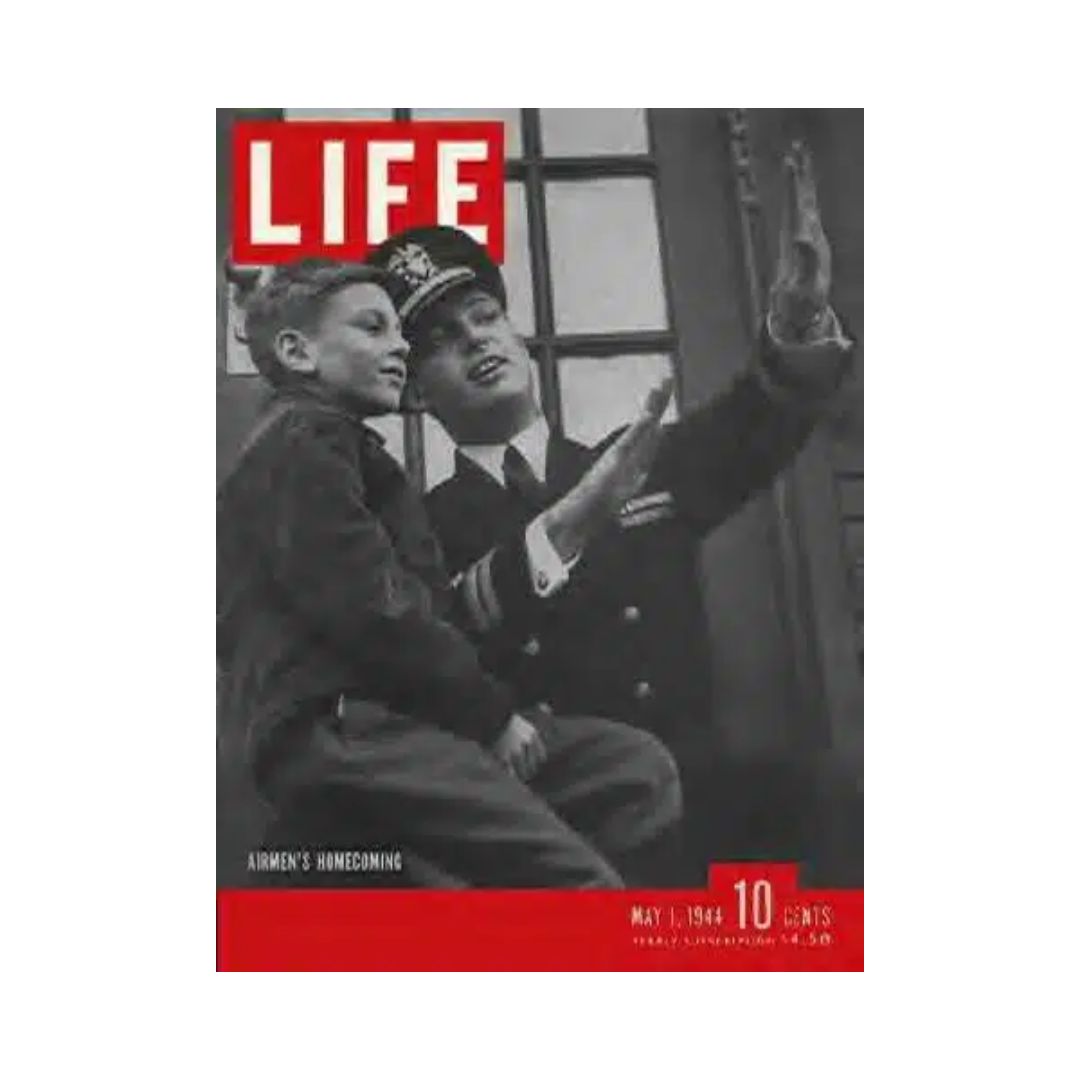 VTG Life Magazine May 1, 1944 featuring U.S. Navy Pilot homecoming, showcasing a touching moment between a pilot and a young boy on the cover.