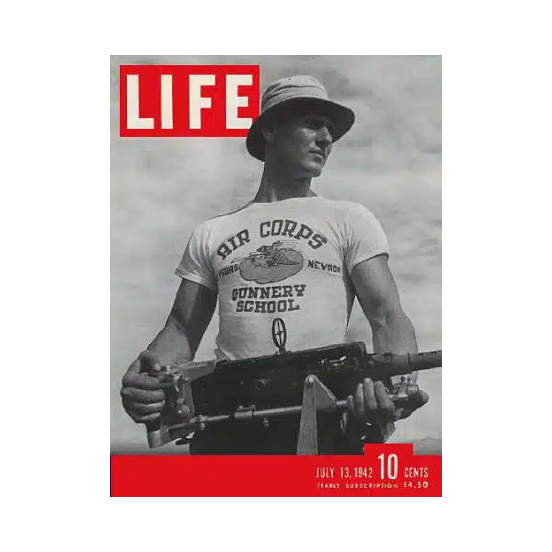 VTG Life Magazine July 13, 1942 featuring a soldier in a Gunnery School T-shirt holding a firearm, illustrating military training during World War II.