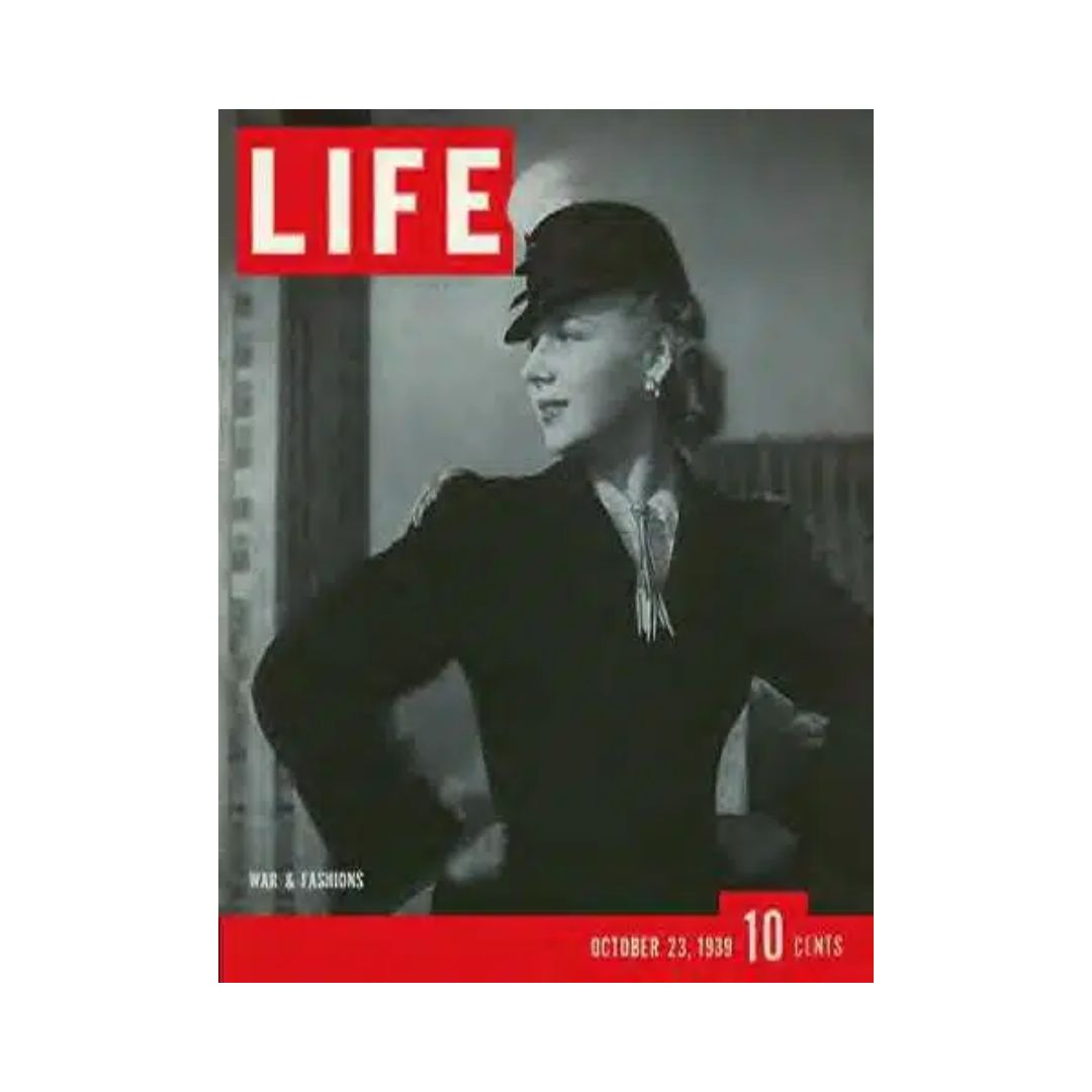 Cover of VTG Life Magazine from October 23, 1939 featuring the theme 'War & Fashion' with a focus on military look, showcasing a stylish woman in vintage attire.