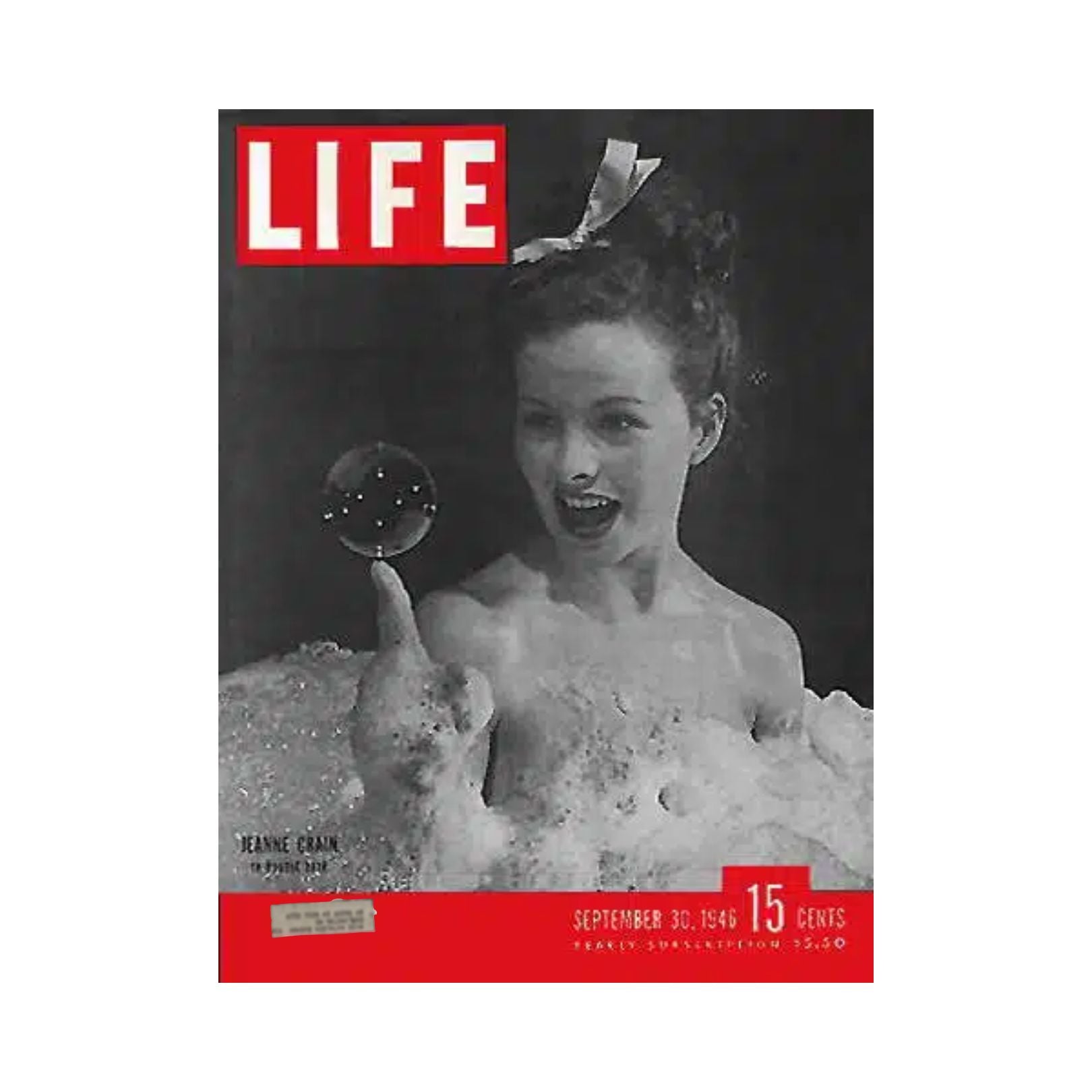 Cover of VTG Life Magazine dated September 30, 1946 featuring Jeanne Crain enjoying a bubble bath, showcasing mid-century glamour and style.