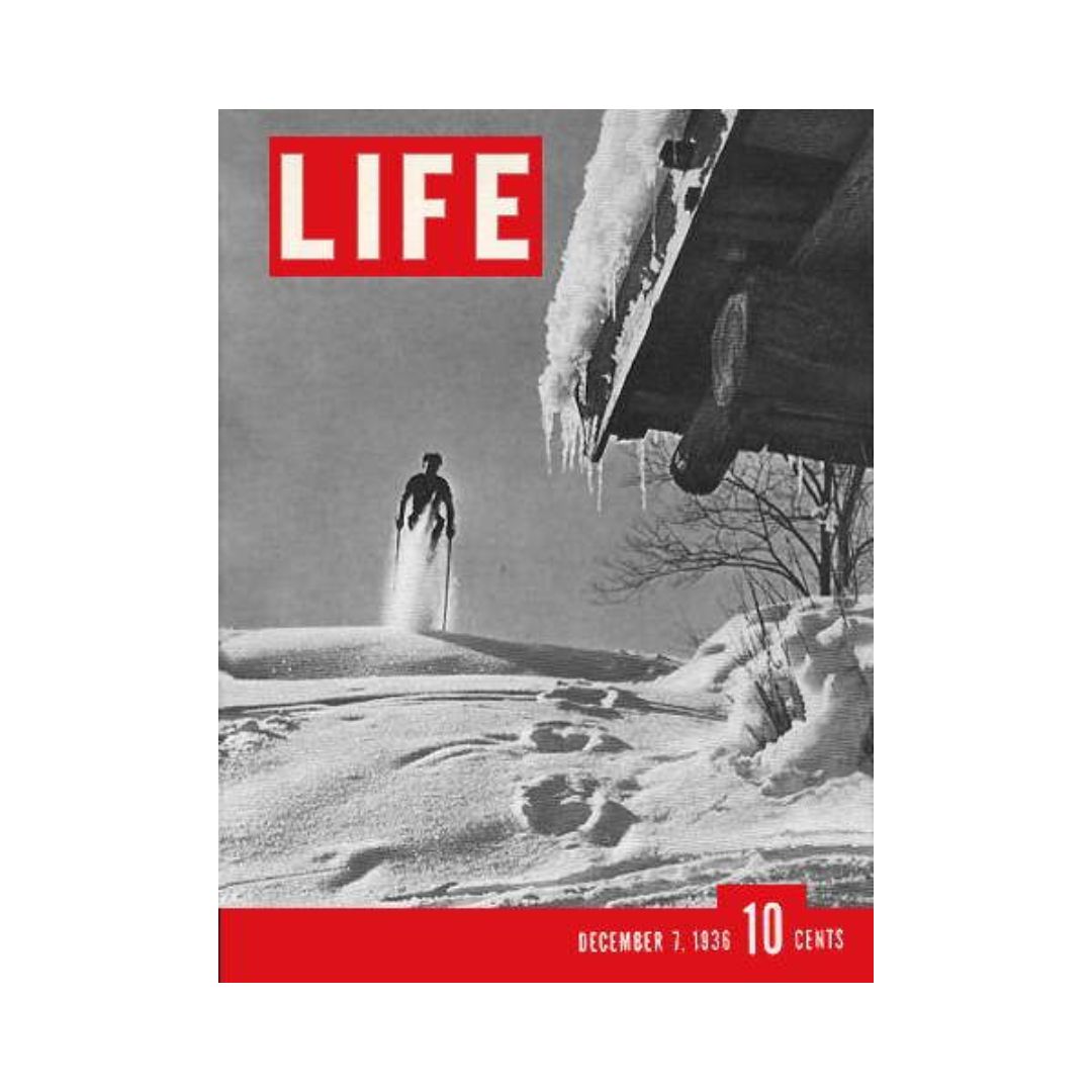 Cover of VTG Life Magazine from December 7, 1936, featuring a skier against a snowy backdrop, showcasing the thrilling world of skiing and winter sports.