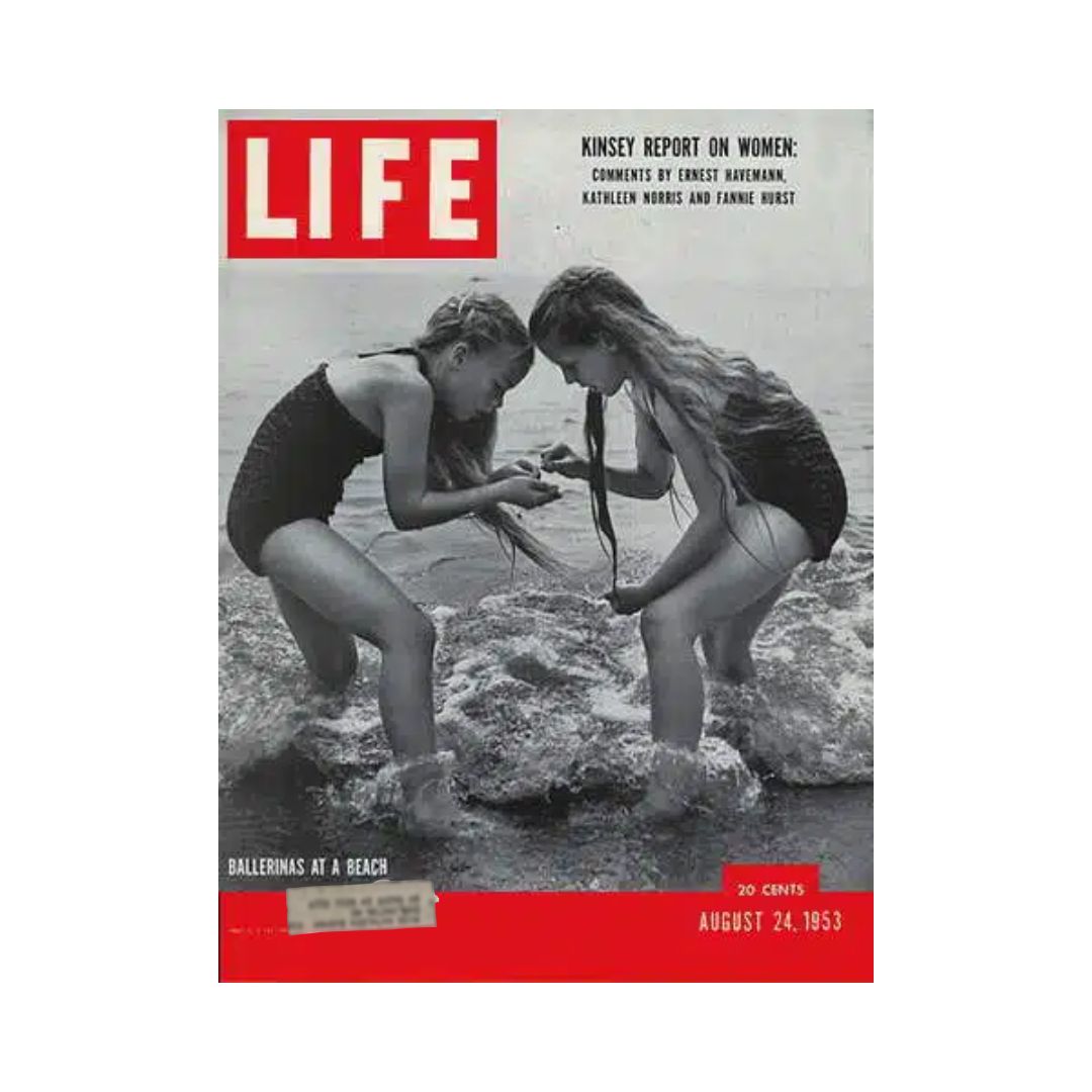 Vintage Life Magazine cover from August 24, 1953, depicting two ballerinas playing at the beach, capturing a playful moment reflecting the culture and style of the 1950s.