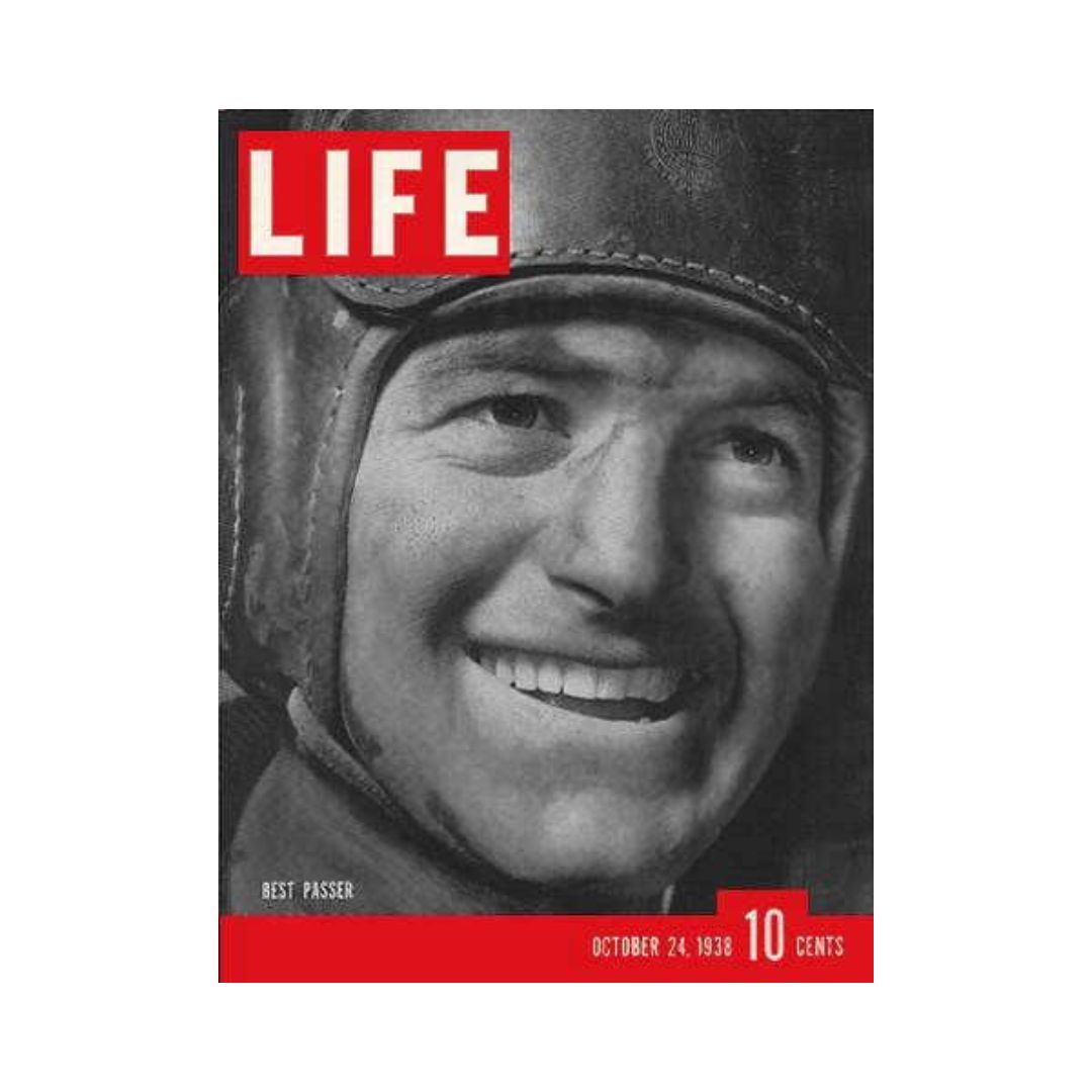 Cover of VTG Life Magazine dated October 24, 1938, featuring Sid Luckman, showcasing the title 'LIFE' and the text 'Best Passer' along with a smiling portrait of Sid Luckman in a football helmet.