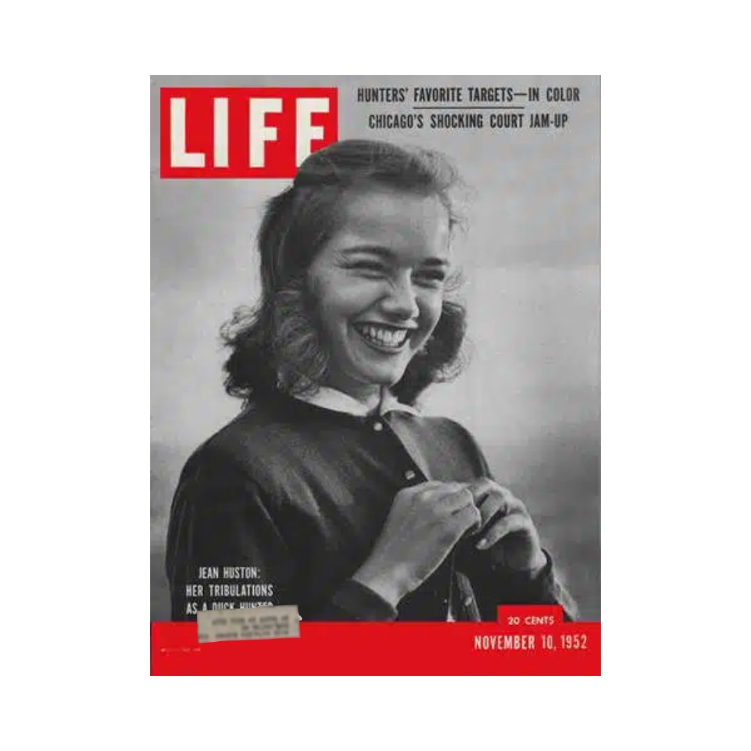 VTG Life Magazine November 10, 1952 cover featuring Jean Huston, a dedicated duck hunter, smiling and showcasing the nostalgic design of mid-20th-century American magazine culture.
