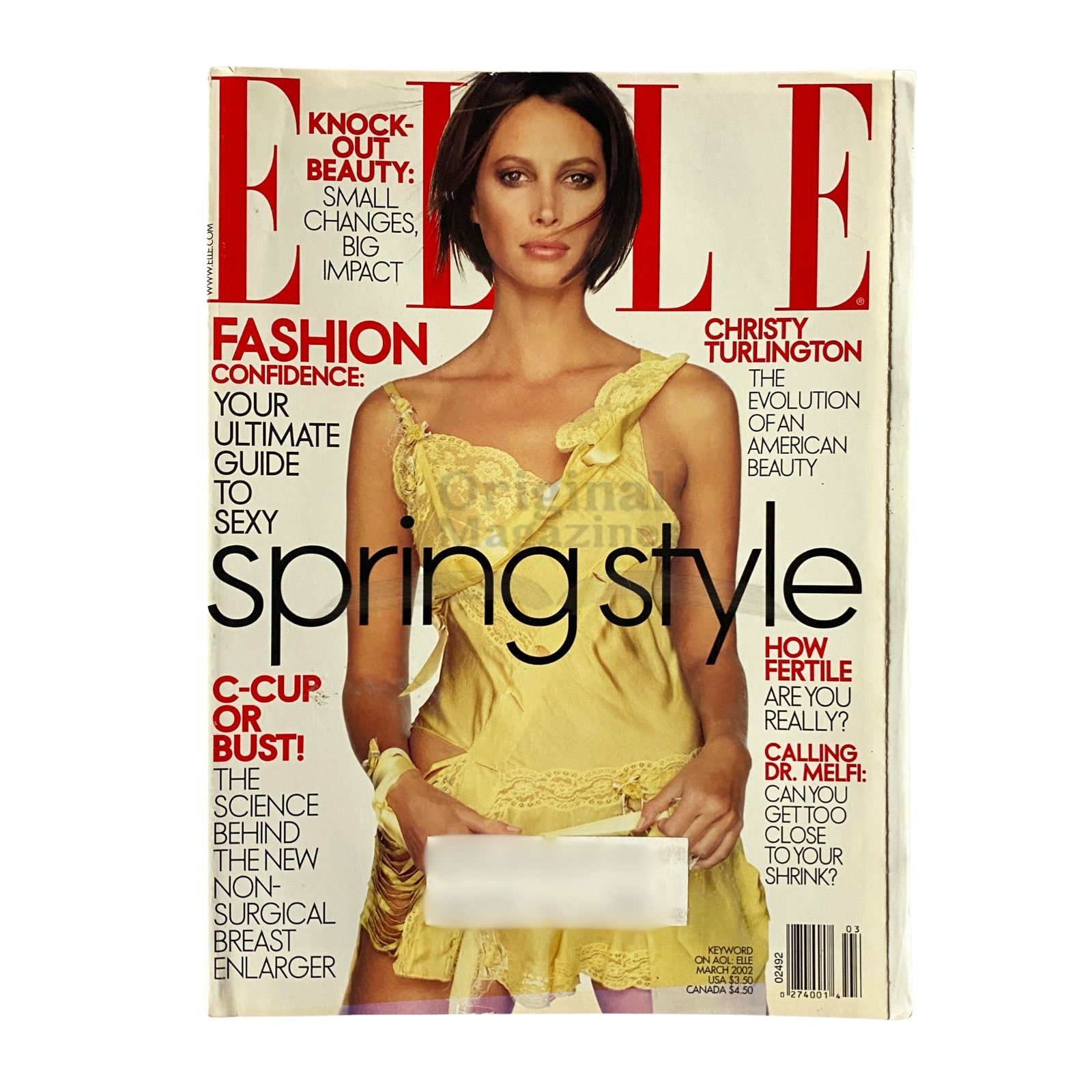Elle Magazine March 2002 cover featuring Christy Turlington, showcasing spring style fashion trends with a stunning yellow outfit, an essential collectible for vintage magazine enthusiasts.