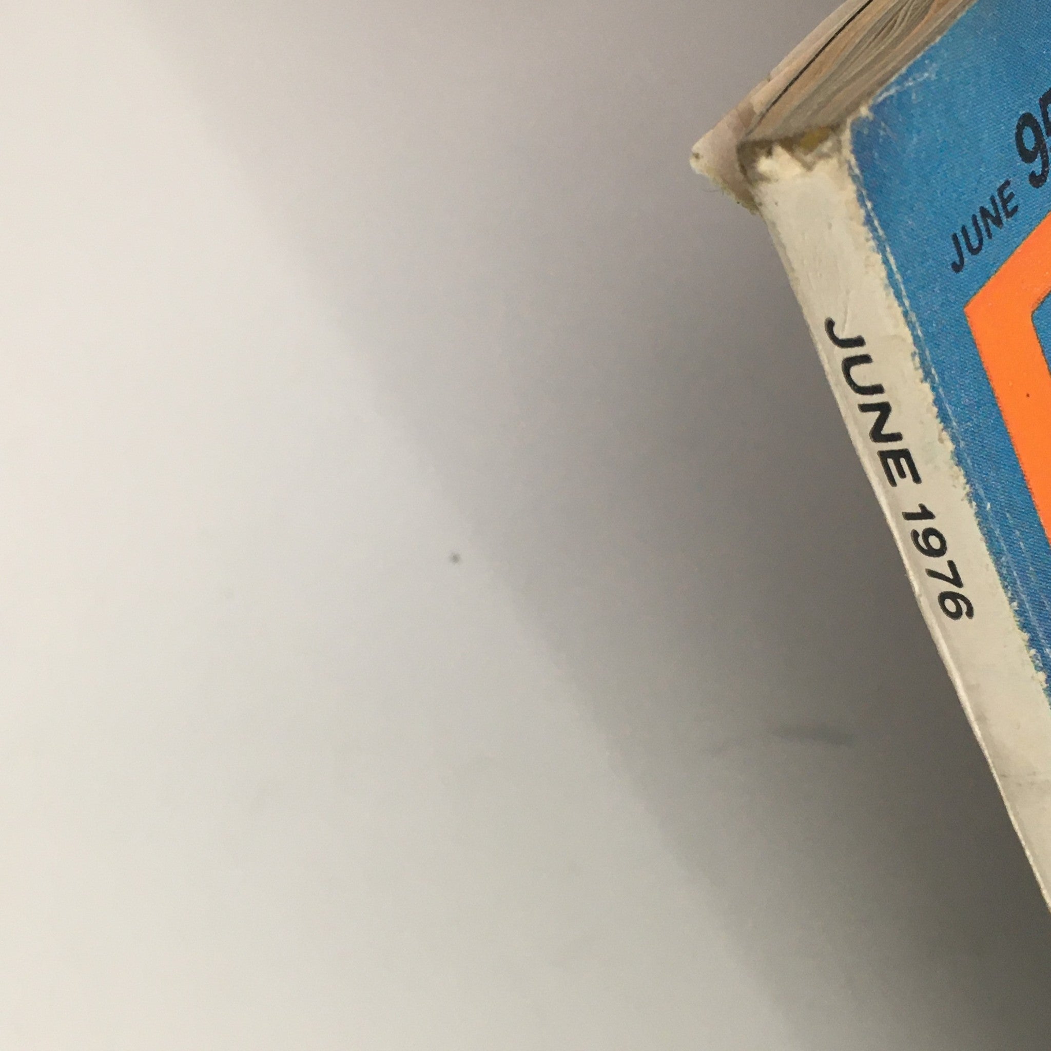 Side view of the June 1976 issue of Redbook Magazine, showcasing the publication's title and date, emphasizing its vintage nature and collectible status.