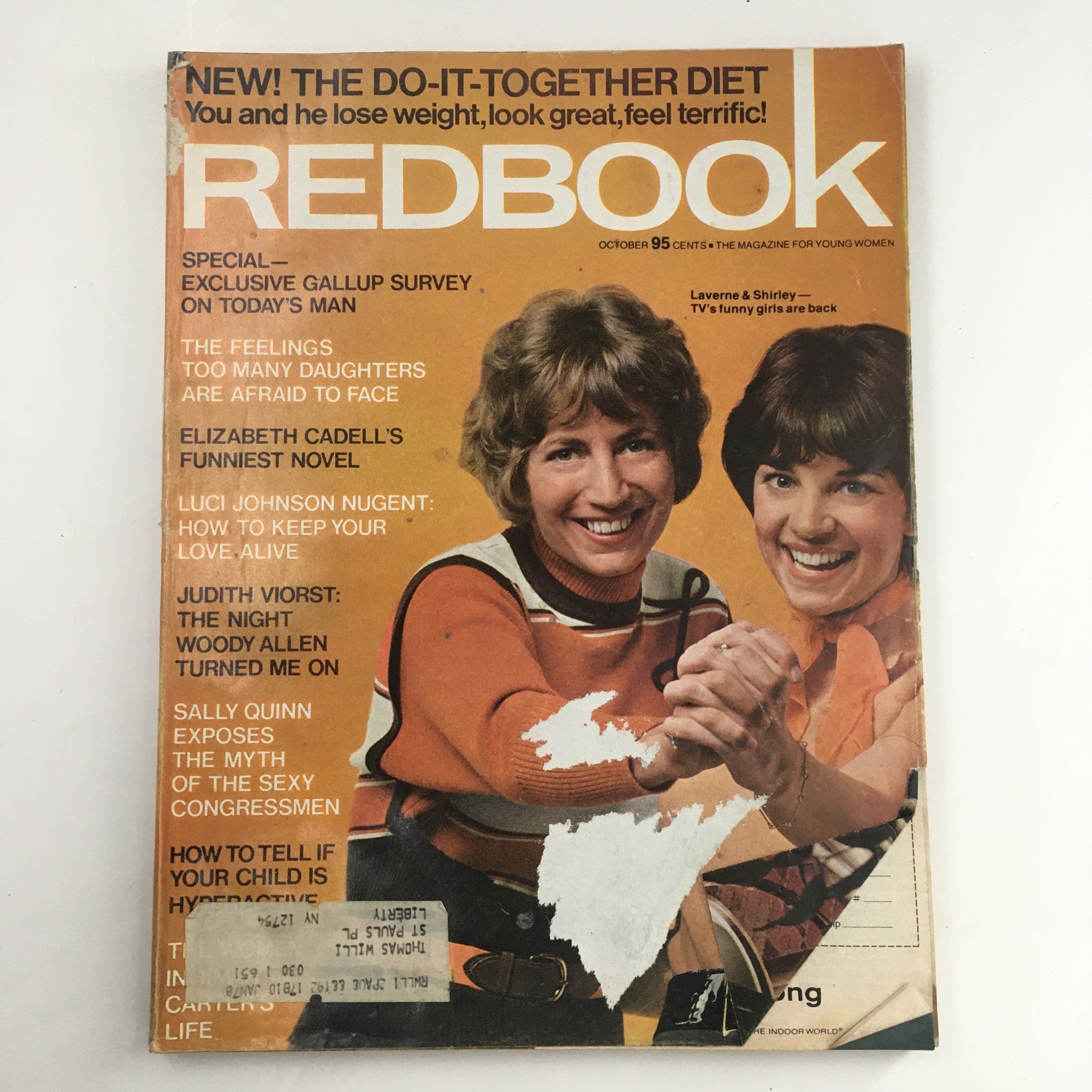 Cover of Redbook Magazine October 1976 featuring Penny Marshall and Cindy Williams from Laverne & Shirley, highlighting articles and features of the issue.