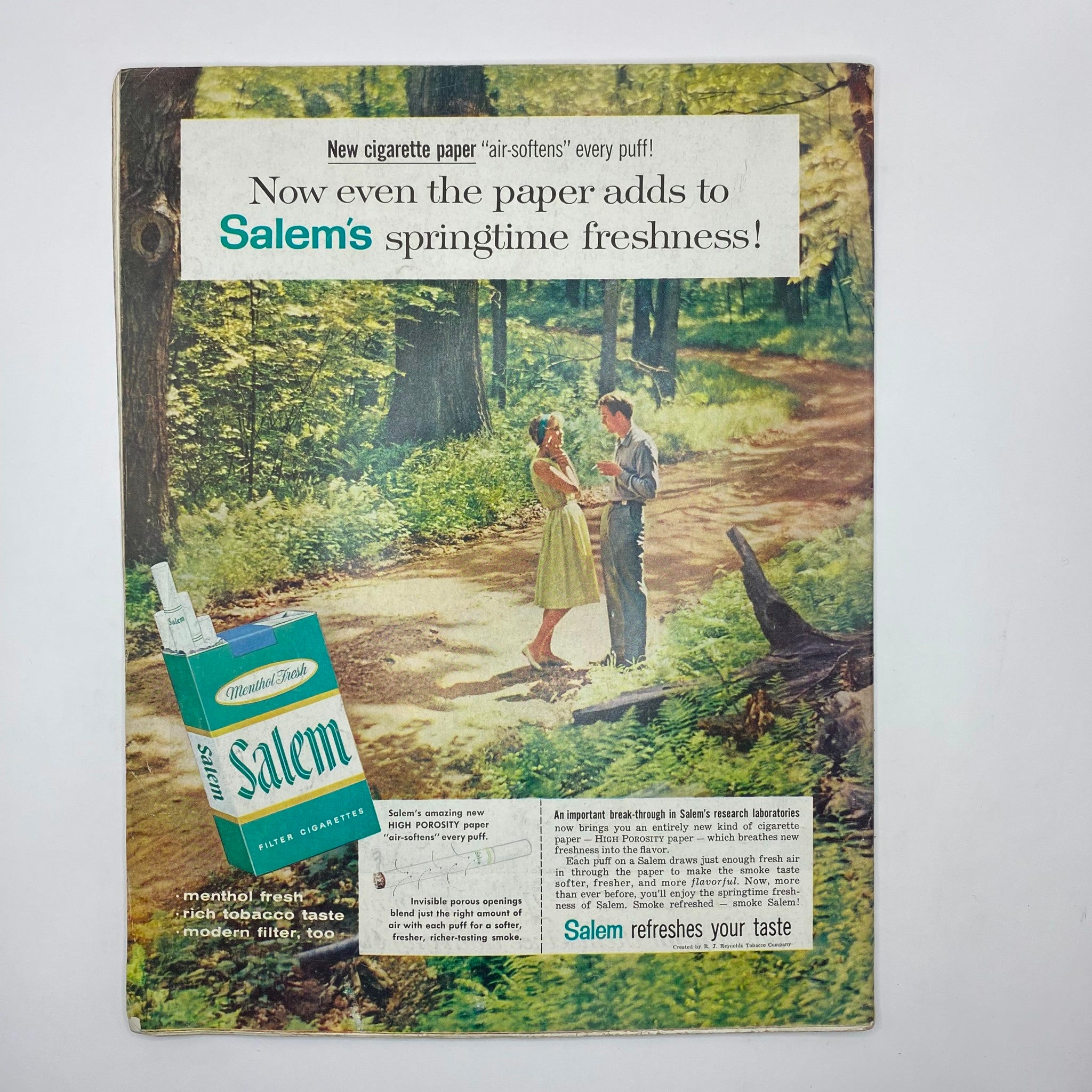 Back cover of Saturday Evening Post Magazine December 19, 1959, featuring an advertisement for Salem cigarettes, showcasing a couple in a springtime forest.