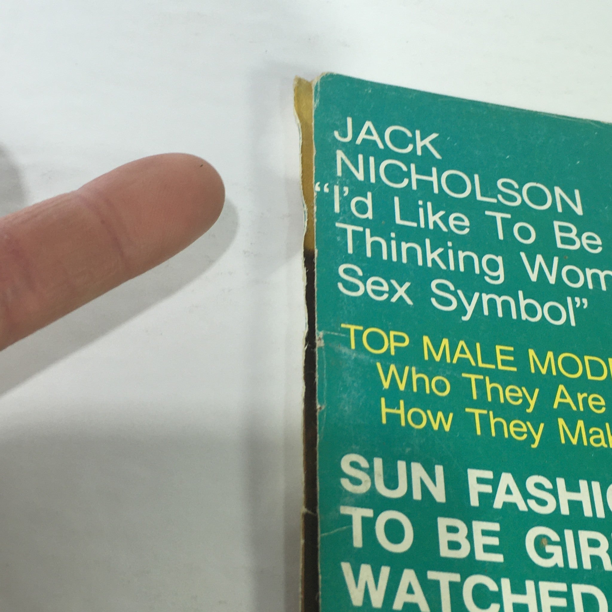 Close-up of VTG Girl Talk Magazine: Summer 1976 cover showcasing Jack Nicholson's quote and article titles related to male models and fashion.