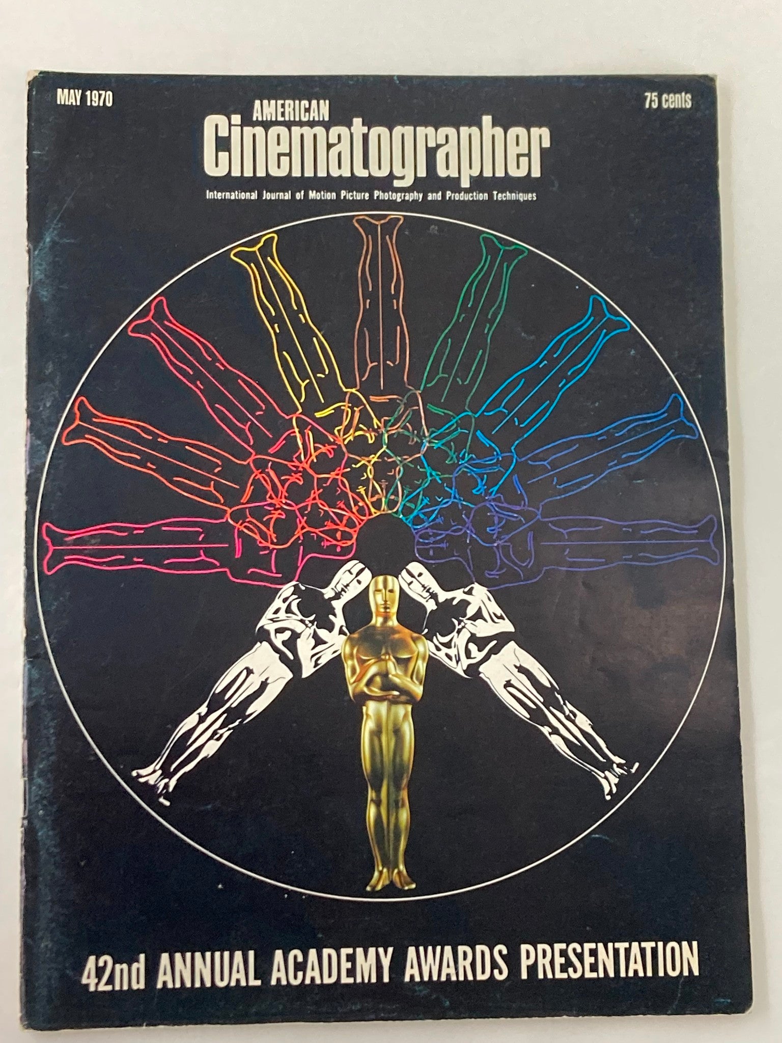 Cover of American Cinematographer Magazine from May 1970 featuring the 42nd Annual Academy Awards presentation, showcasing a stylized golden Oscar statue surrounded by colorful depictions of film figures.