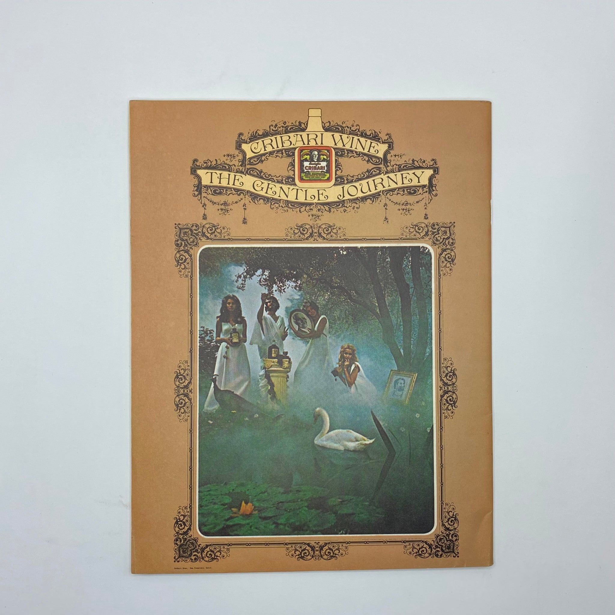 Cover page of the Cribari Wine promotional booklet, featuring a mystical scene with women in white dresses and a swan, emphasizing the theme 'The Gentle Journey'.