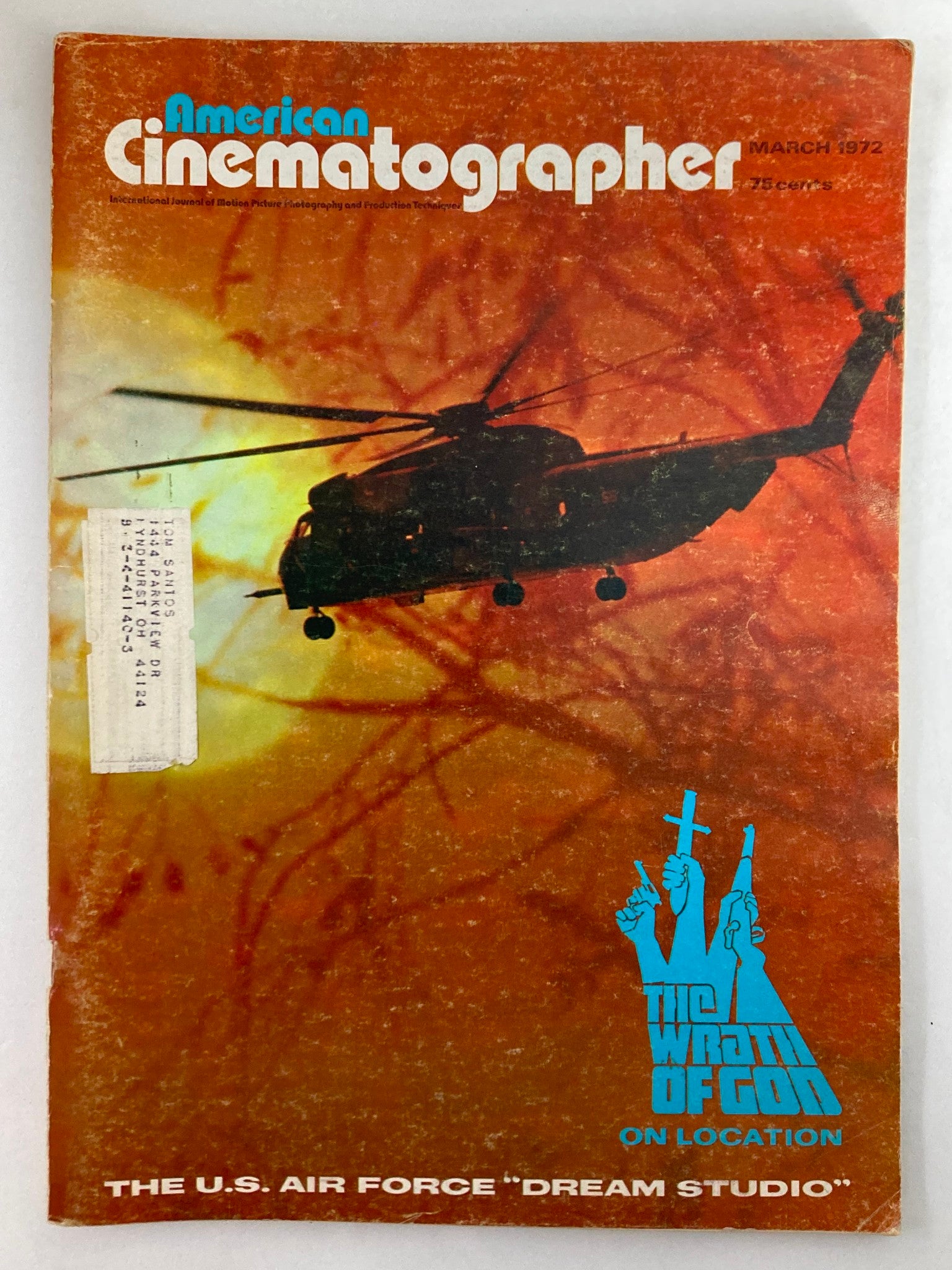 Cover of American Cinematographer Magazine from March 1972 featuring the HH-53 Super Jolly Green Helicopter against a vibrant background. This vintage magazine highlights aviation and cinematography insights.