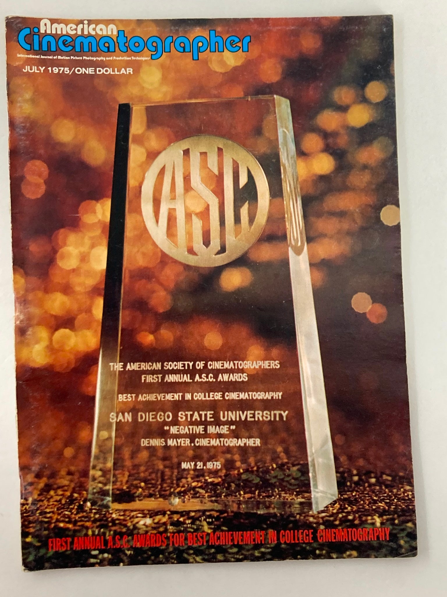 Cover of American Cinematographer Magazine July 1975 featuring the Award for Best Achievement in College Cinematography, honoring San Diego State University for 'Negative Image' with cinematographer Dennis Mayer.