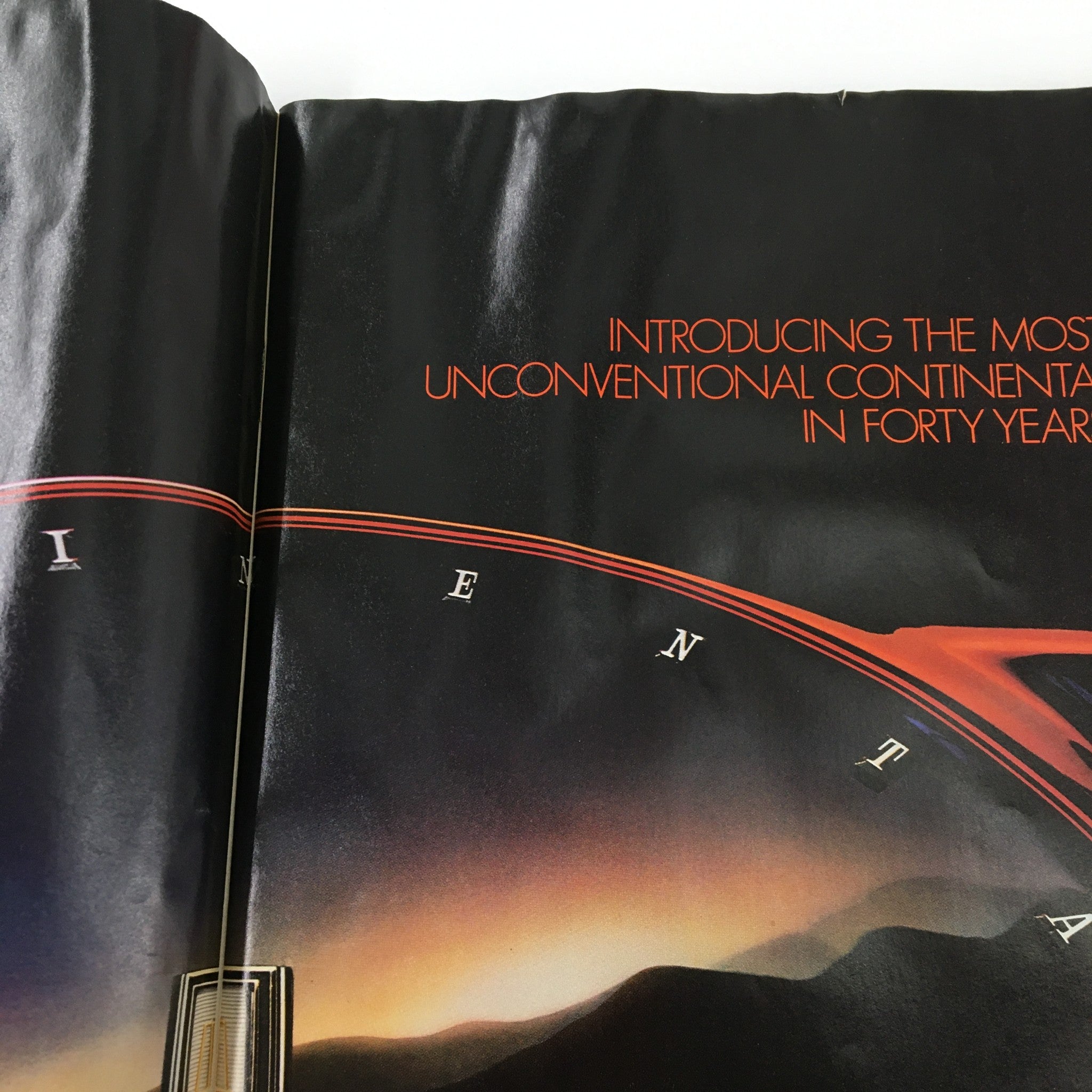 A prominent ad page from VTG Gourmet Magazine October 1981 titled 'Introducing the Most Unconventional Continental in Forty Years' featuring a black background and striking typography.