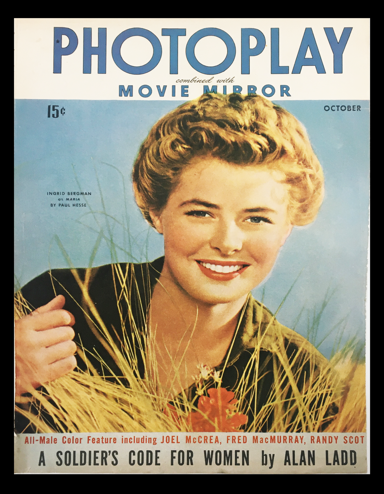 COVER ONLY Photoplay Movie-Mirror October 1943 featuring Ingrid Bergman with a smiling expression, surrounded by tall grass, showcasing vintage magazine design elements.
