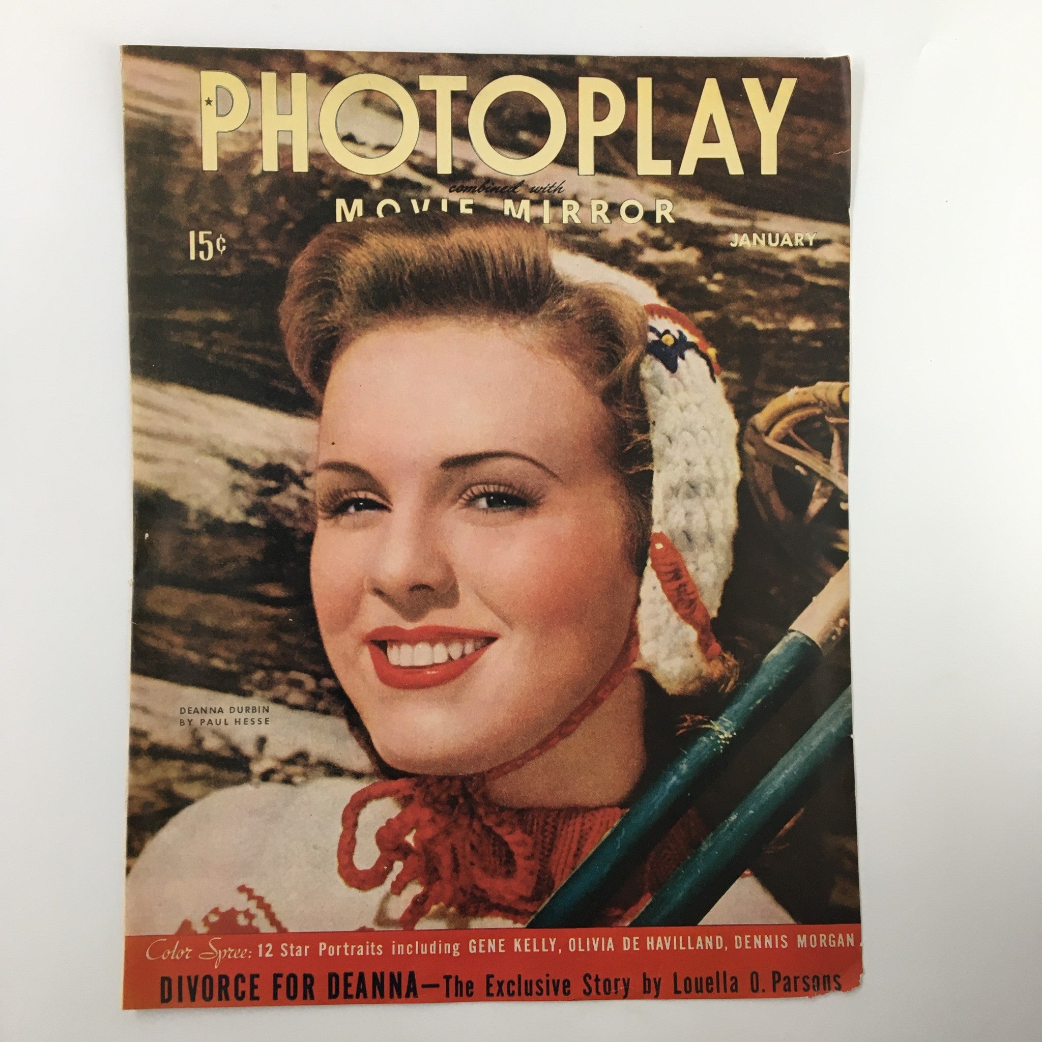 Cover of the January 1944 Photoplay Movie Mirror magazine, featuring Deanna Durbin. This charming image captures the iconic actress' radiant smile and vintage style, ideal for collectors and fans of classic cinema.