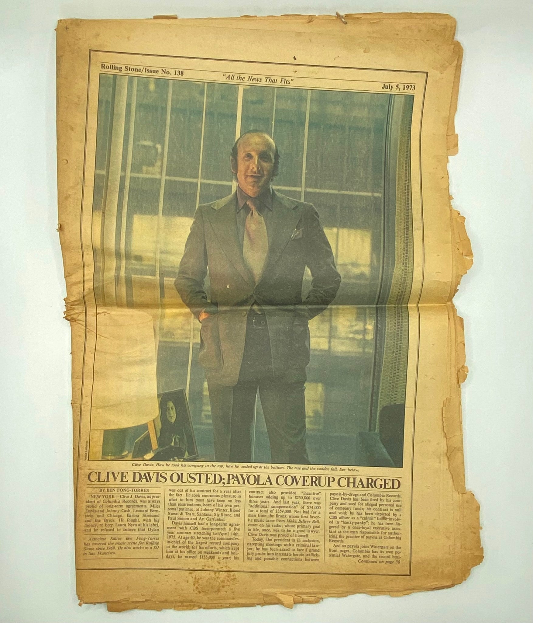 Inside of Rolling Stone Magazine July 5 1973 Issue No. 138, featuring an article about Clive Davis, presenting a formal photograph of him in a suit.