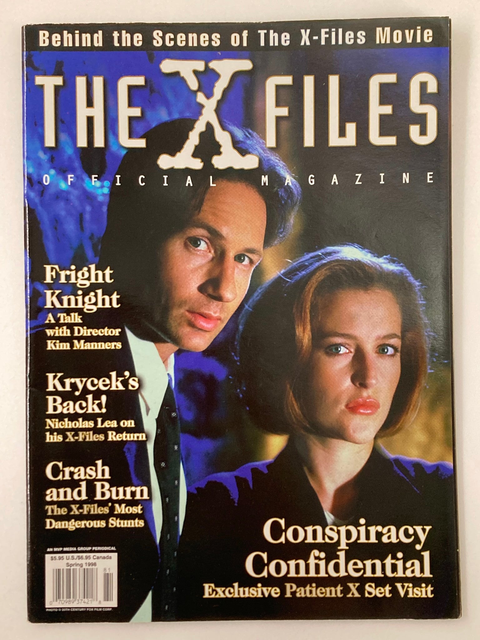 The X-Files Magazine Spring 1998 featuring David Duchovny and Gillian Anderson on the cover. The magazine highlights articles about the X-Files movie and contains features like 'Fright Knight', 'Krycek's Back!', and 'Conspiracy Confidential'. Good condition with minor wear, includes protective covering.