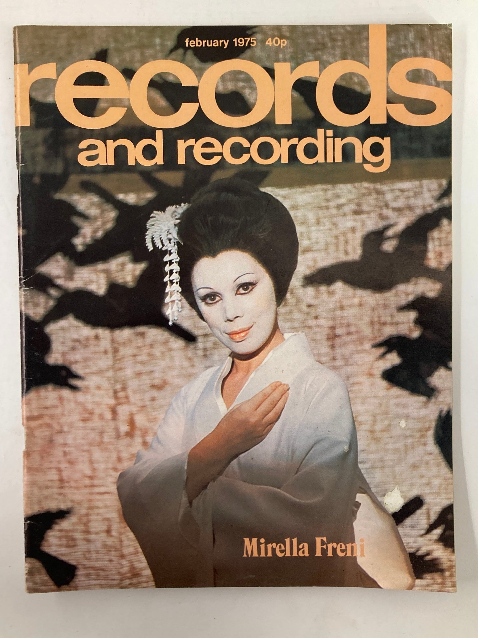 Cover of VTG Records & Recording Magazine from February 1975 featuring Mirella Freni, showcasing her in a traditional attire with a striking hairstyle and makeup, set against a patterned background.