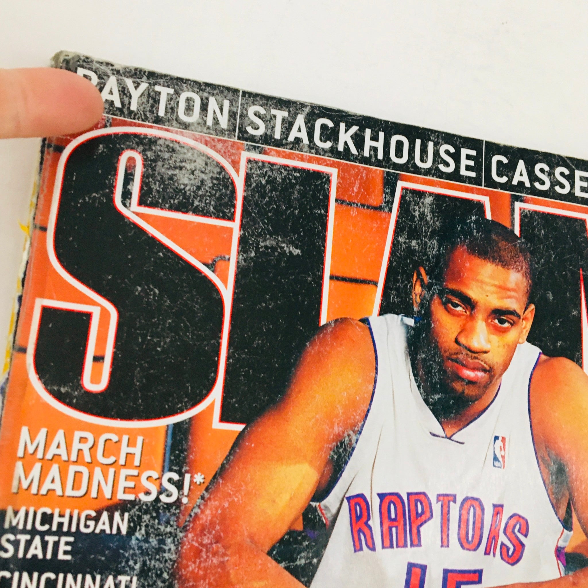 Cover of Slam Magazine April 2000 featuring Ray Allen, highlighting March Madness and showcasing athletes like Cassell and Stackhouse.