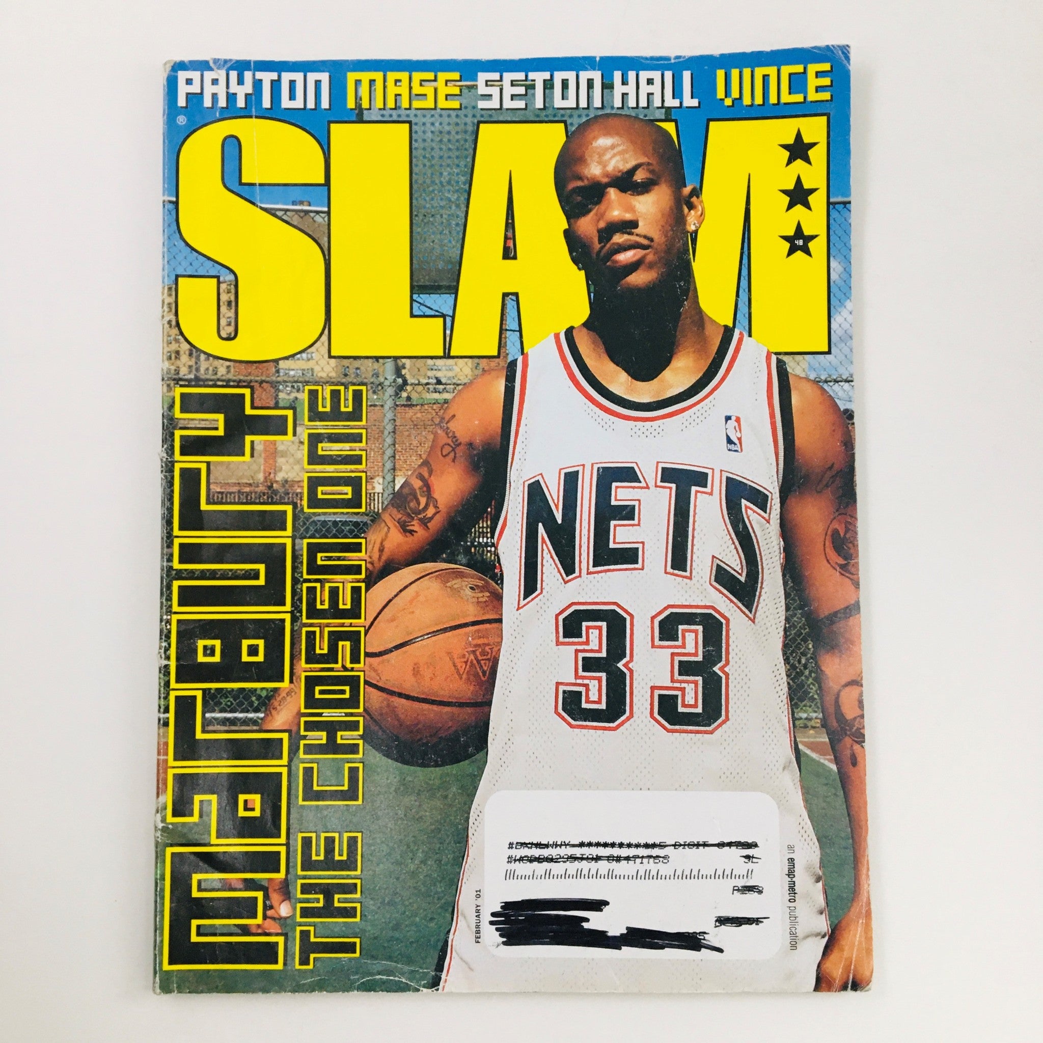Slam Magazine February 2001 featuring Stephon Marbury on the front cover, showcasing his iconic pose and jersey as part of the vintage basketball collectible.