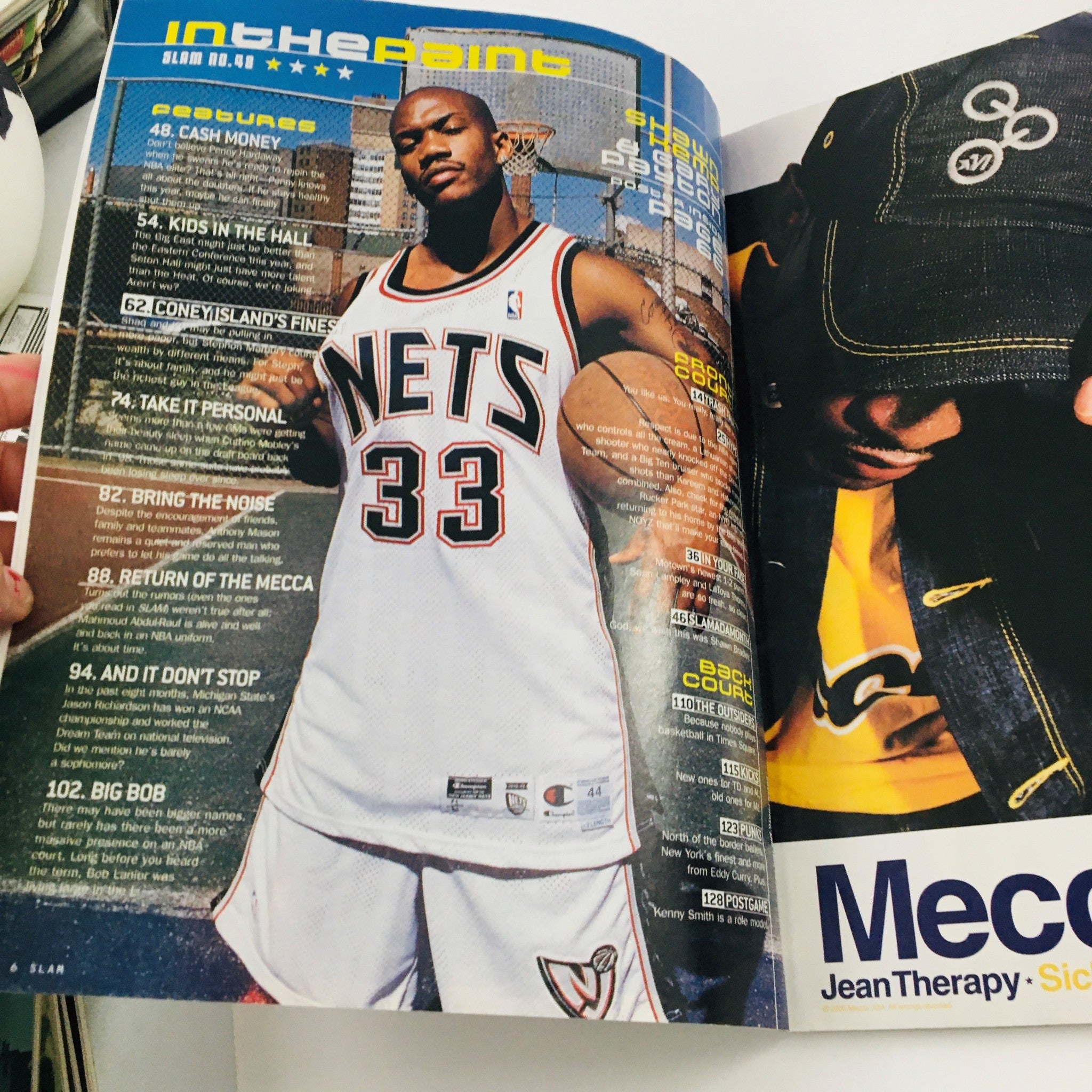 Slam Magazine February 2001 featuring Stephon Marbury in a New Jersey Nets uniform, showcasing a vibrant basketball lifestyle and dynamic content.