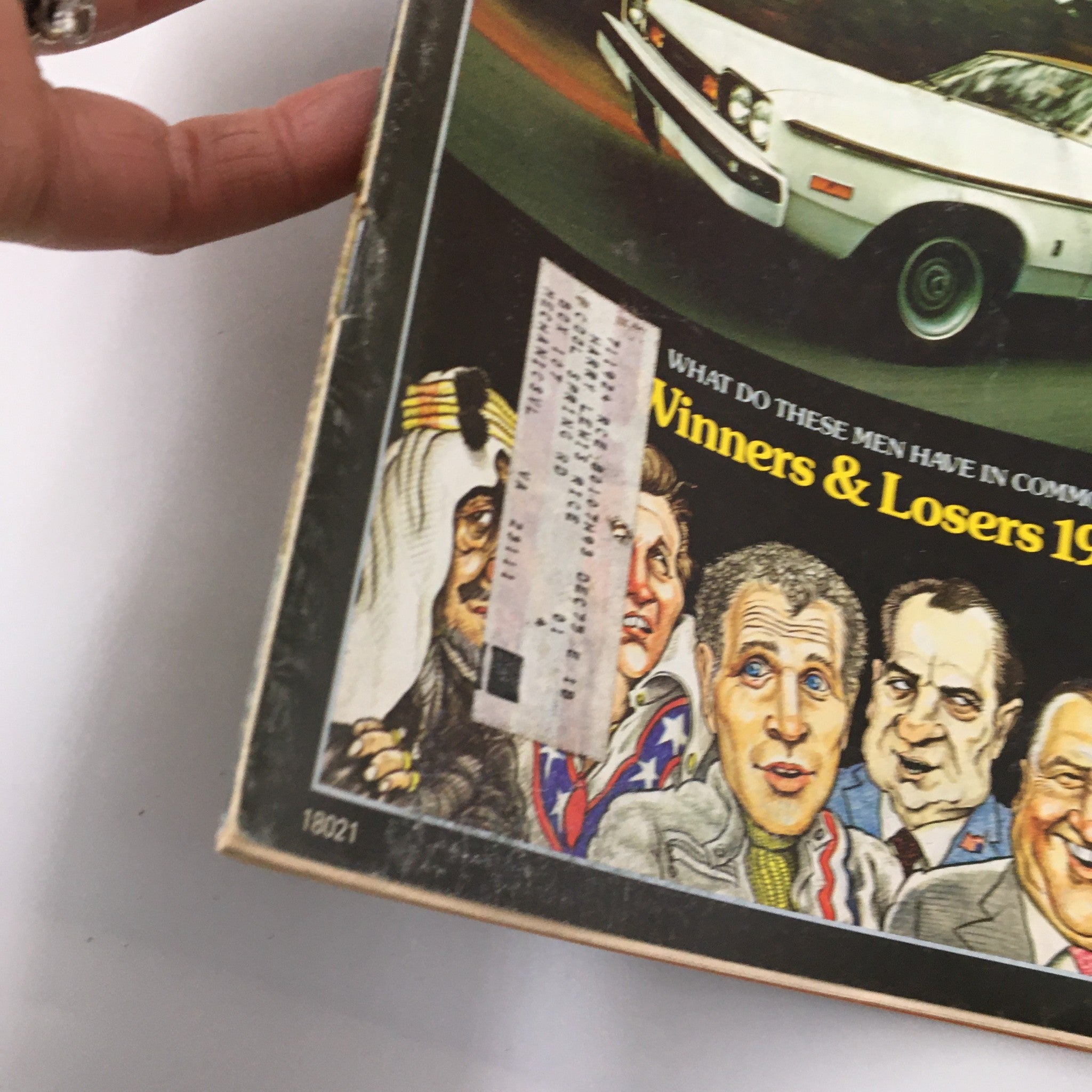 Cover of VTG Car and Driver Magazine January 1975 featuring automotive personalities and the iconic statement 'Winners & Losers 1974'.