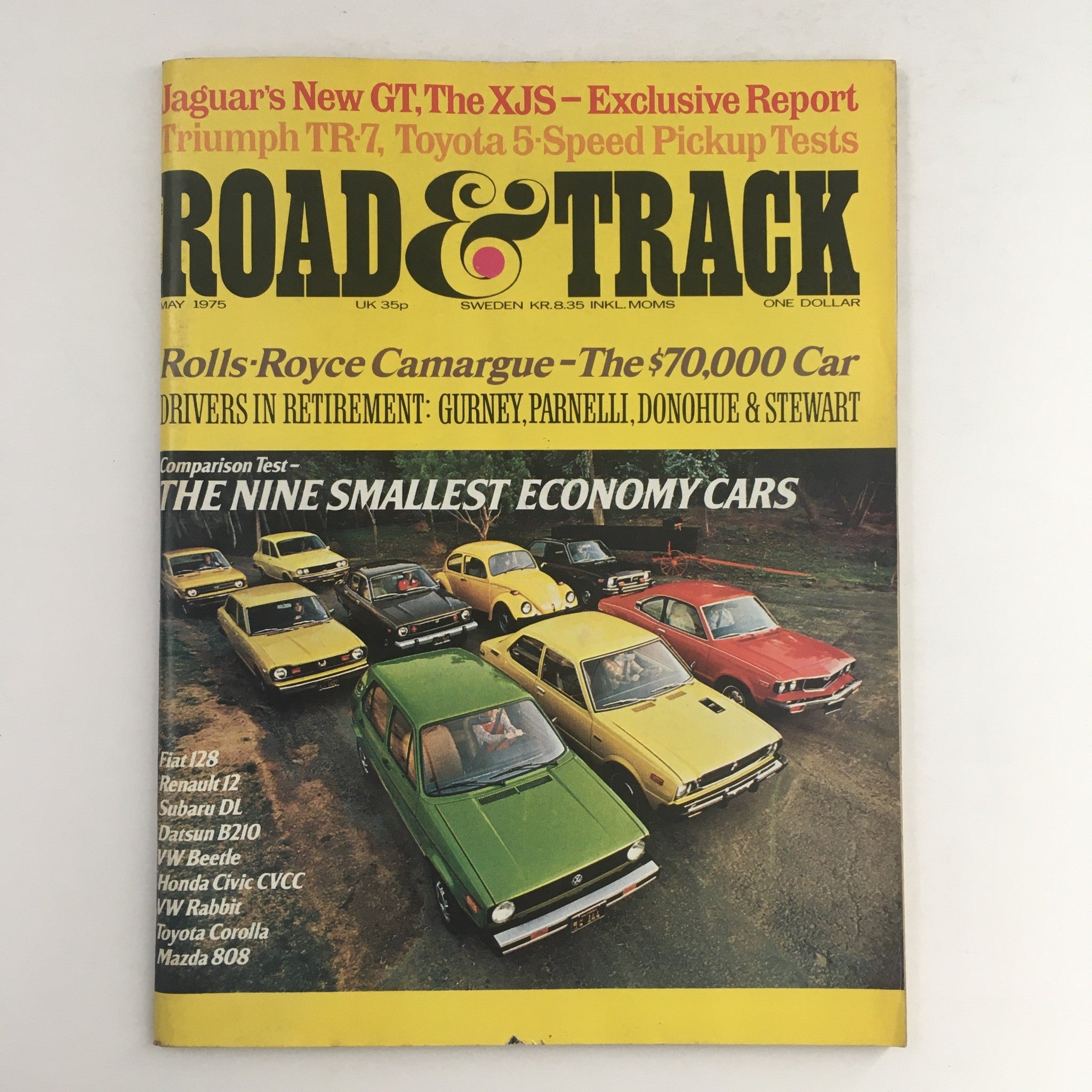 Cover of Road & Track Magazine May 1975 featuring the article 'The Nine Smallest Economy Cars'. The cover showcases various compact economy cars including Fiat 128, Renault 12, and VW Beetle.