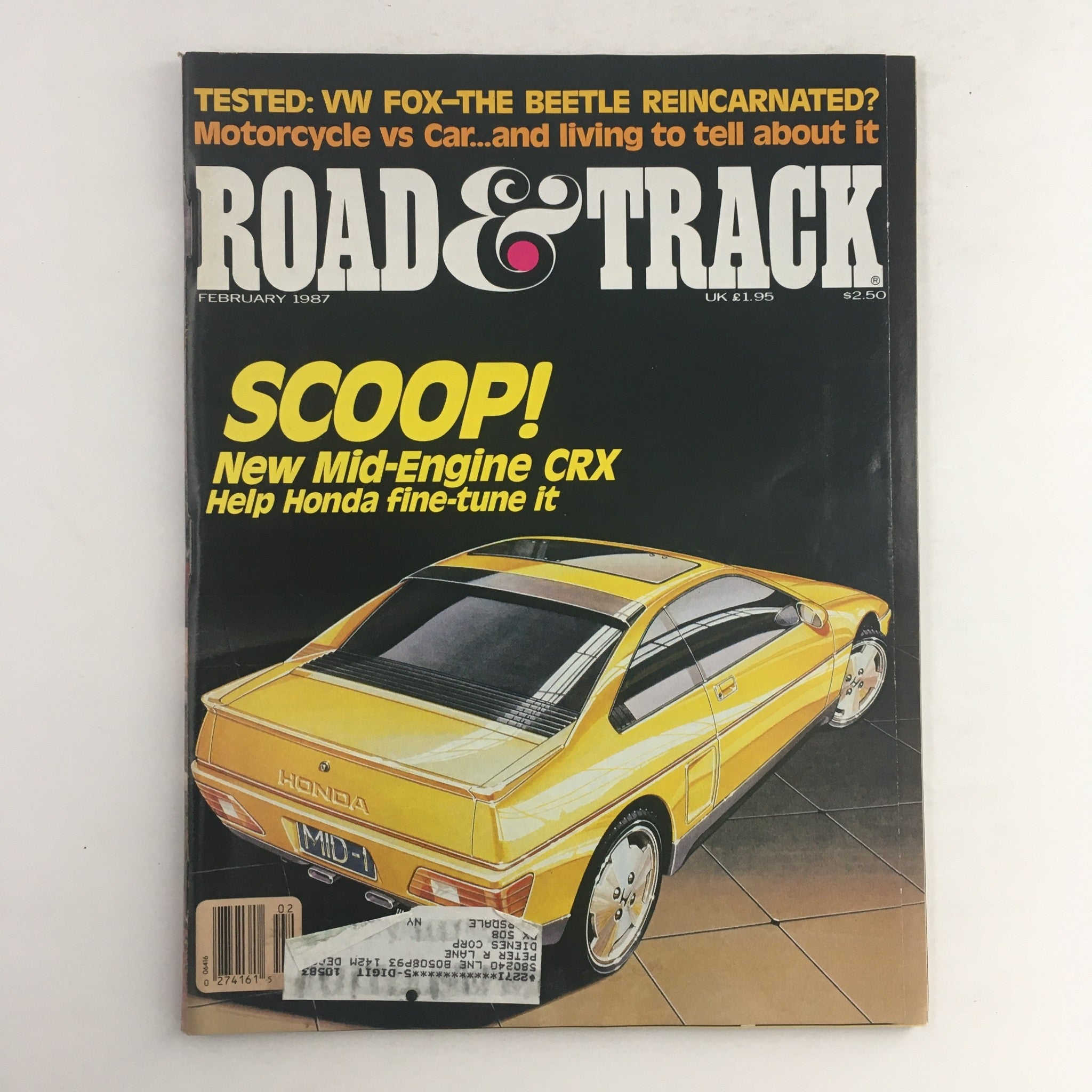 Cover of Road & Track Magazine from February 1987 featuring a vibrant yellow Honda CRX, highlighting the article 'SCOOP! New Mid-Engine CRX Help Honda fine-tune it' along with details about the VW Fox and the classic Beetle.