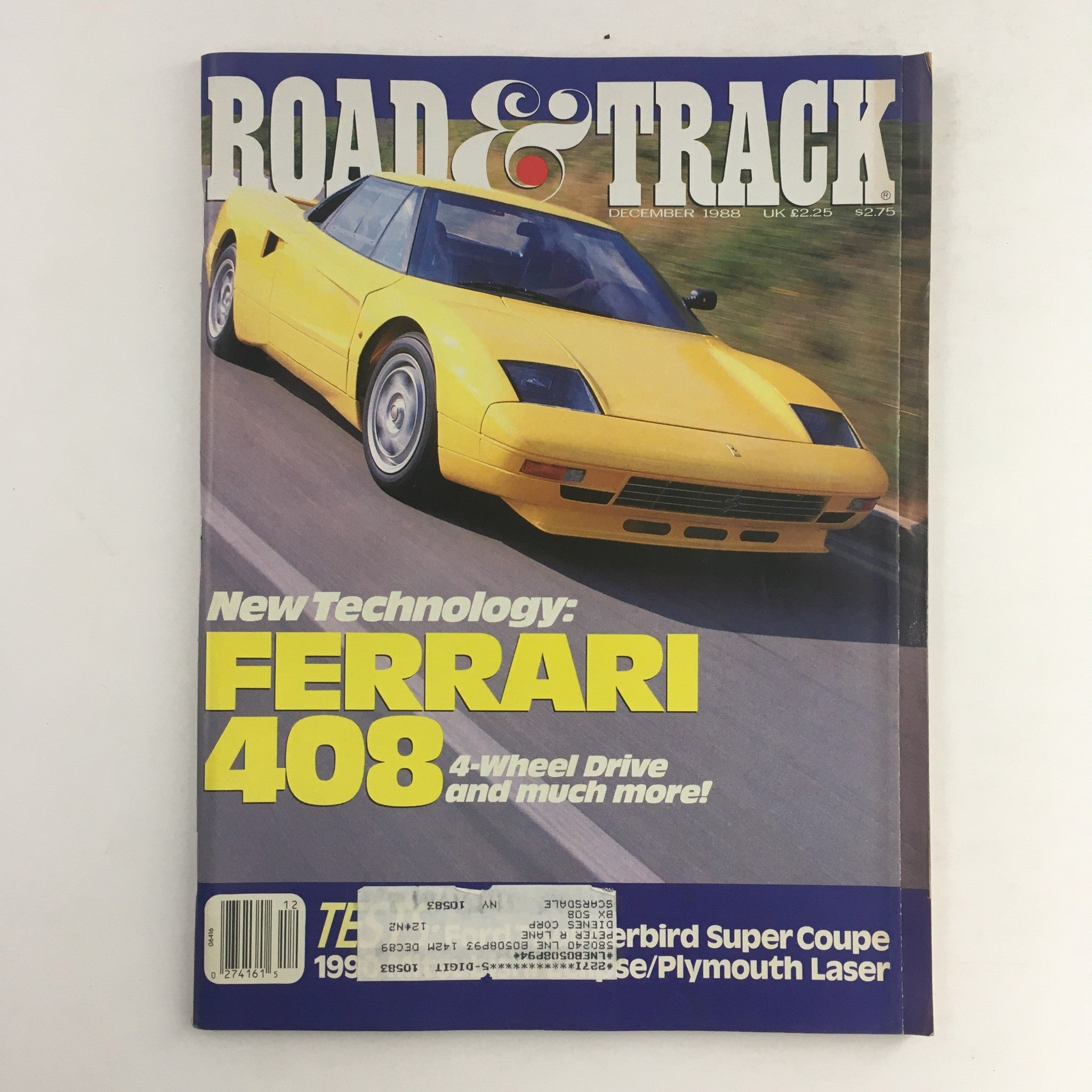 Cover of Road & Track Magazine December 1988 featuring Ferrari 408 4-Wheel Drive technology, showcasing a yellow sports car in motion against a blurred background.