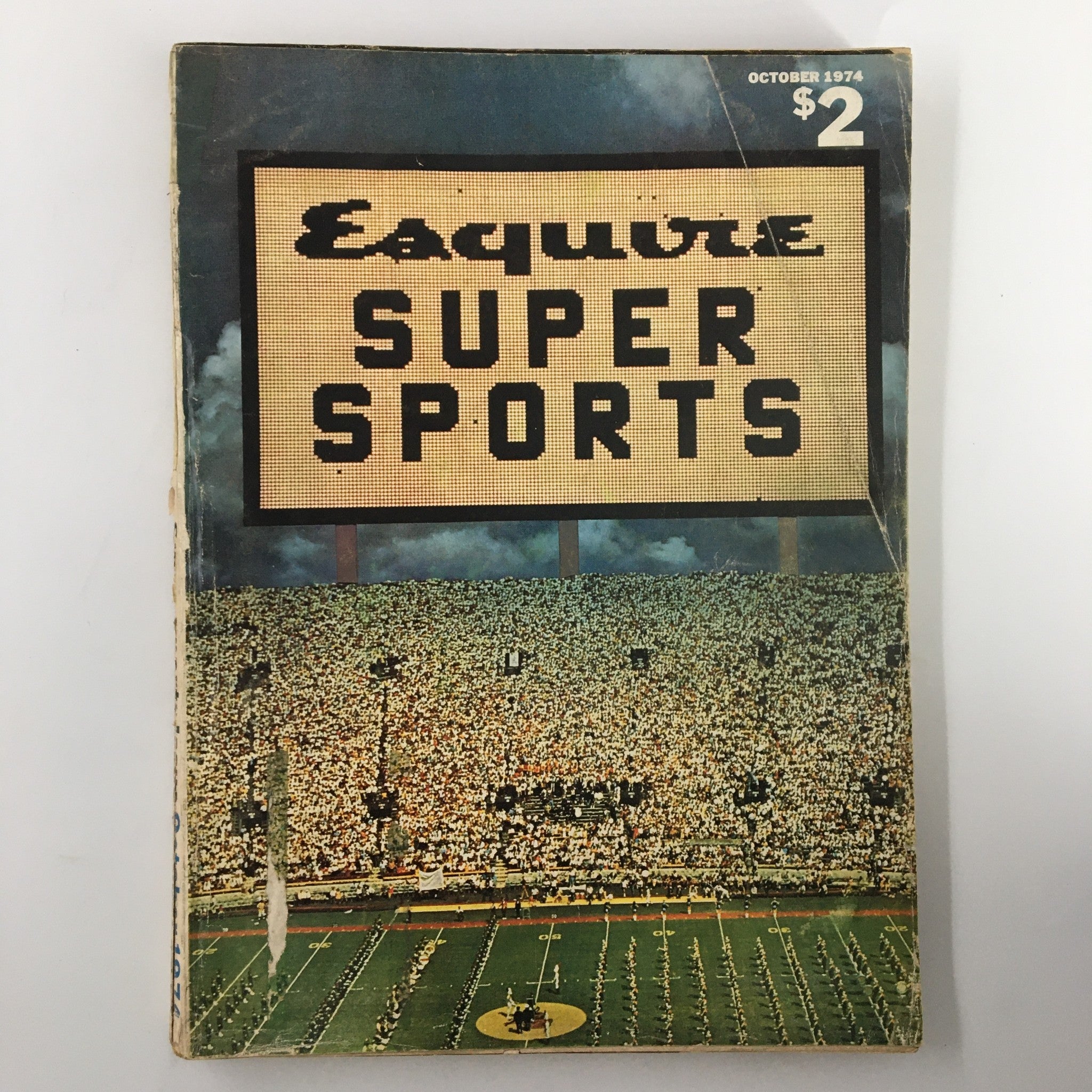 Cover of Esquire Magazine October 1974 featuring 'Super Sports' title, showing a crowd at a sports event and a vintage aesthetic.