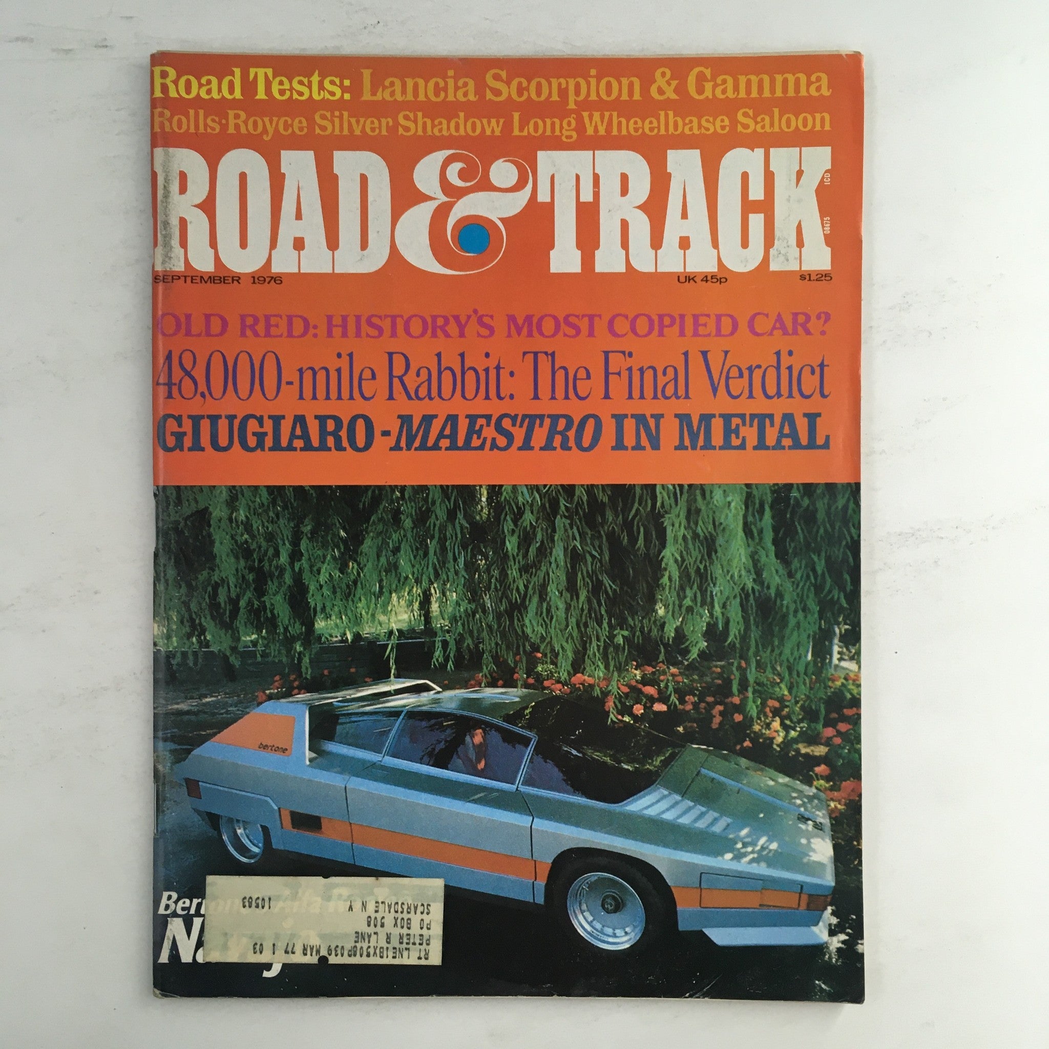 Road & Track Magazine September 1976 featuring road tests of Lancia Scorpion & Gamma with an eye-catching cover showcasing a unique car design surrounded by greenery.